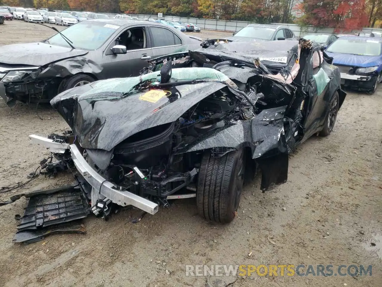 2 fotografías del automóvil dañado 5YJSA1E57MF455547 TESLA MODEL S 2021