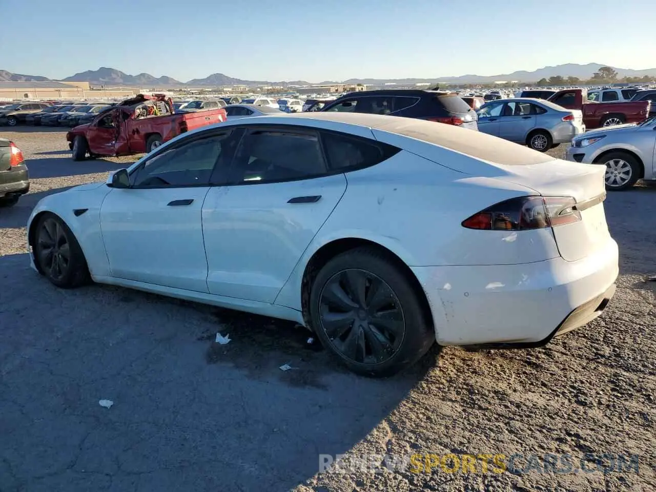 2 fotografías del automóvil dañado 5YJSA1E58MF441446 TESLA MODEL S 2021