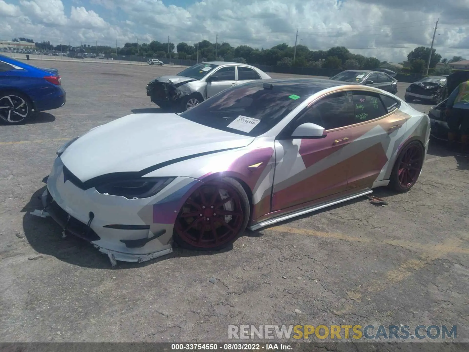 2 fotografías del automóvil dañado 5YJSA1E60MF450876 TESLA MODEL S 2021