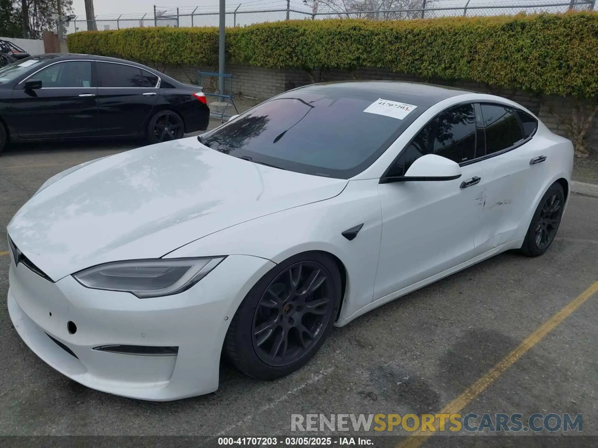 2 fotografías del automóvil dañado 5YJSA1E60MF453678 TESLA MODEL S 2021