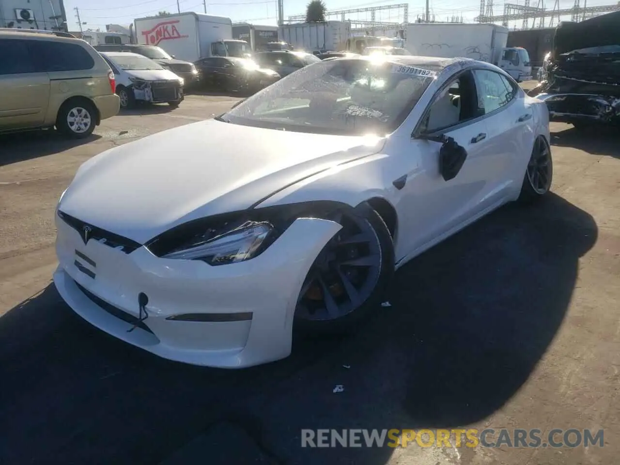 2 fotografías del automóvil dañado 5YJSA1E63MF435093 TESLA MODEL S 2021