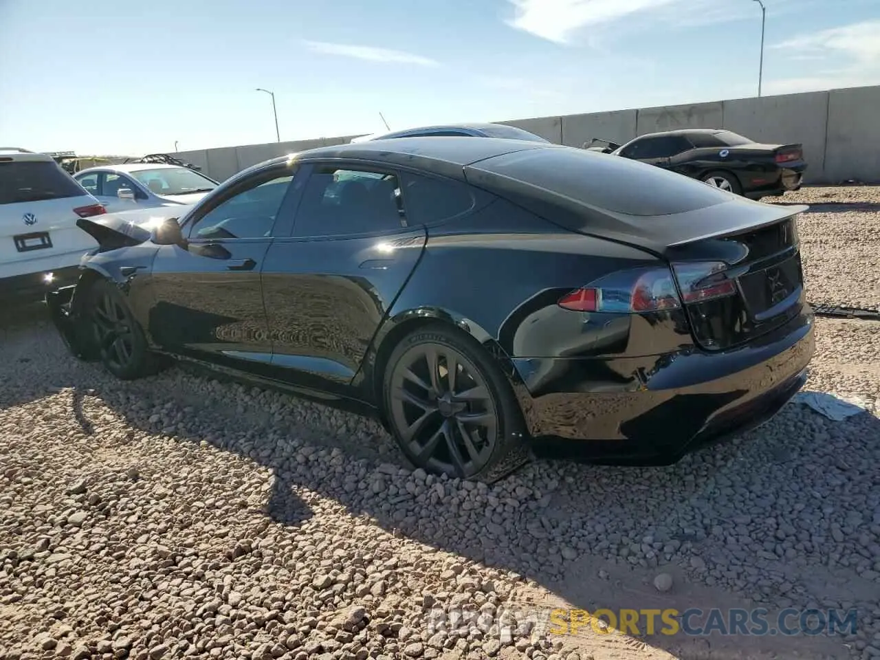 2 fotografías del automóvil dañado 5YJSA1E65MF430784 TESLA MODEL S 2021