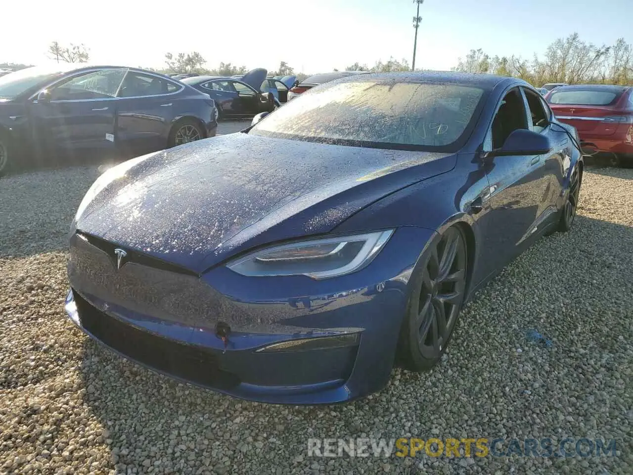 2 fotografías del automóvil dañado 5YJSA1E66MF431734 TESLA MODEL S 2021