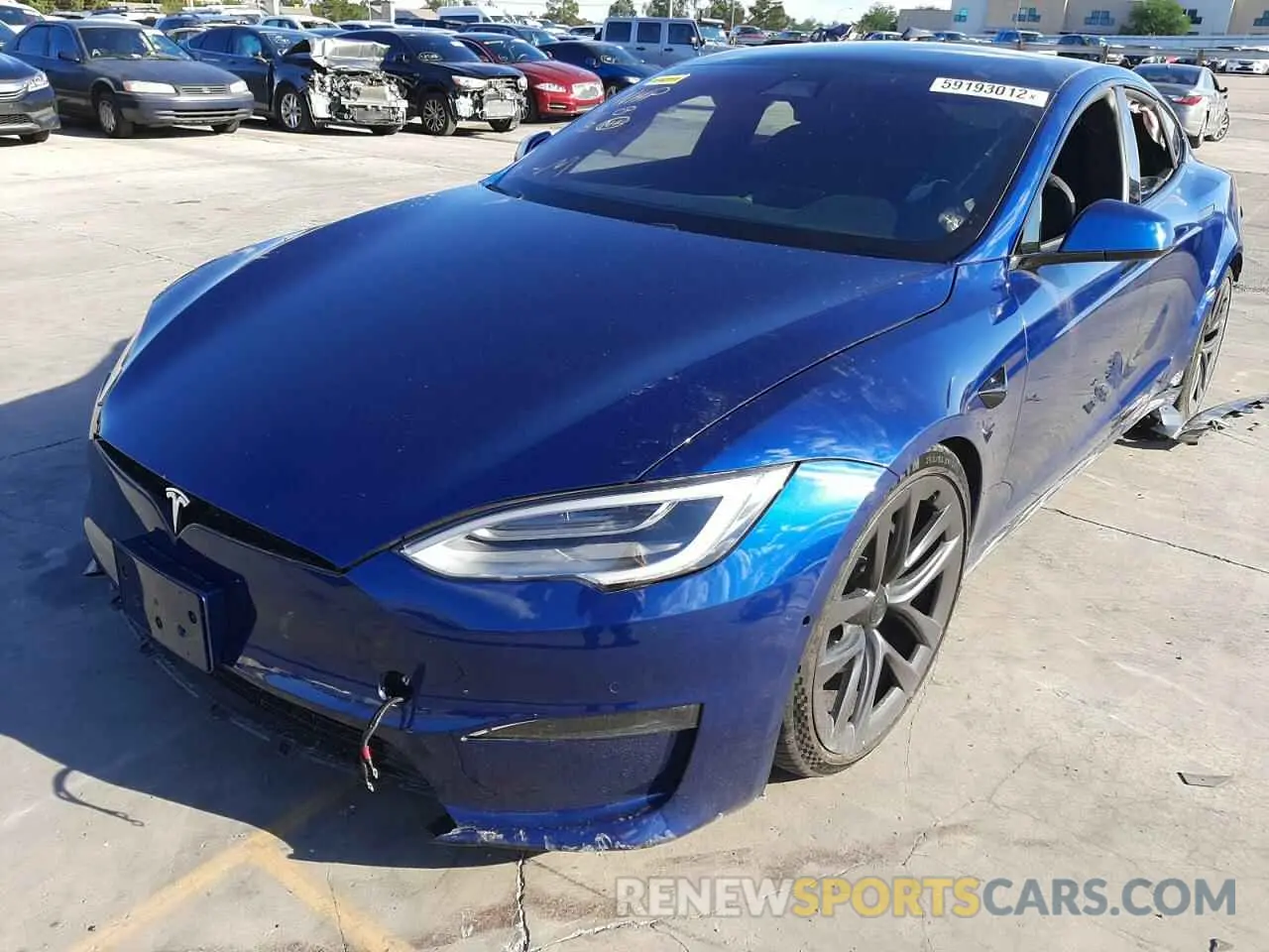 2 fotografías del automóvil dañado 5YJSA1E69MF452352 TESLA MODEL S 2021