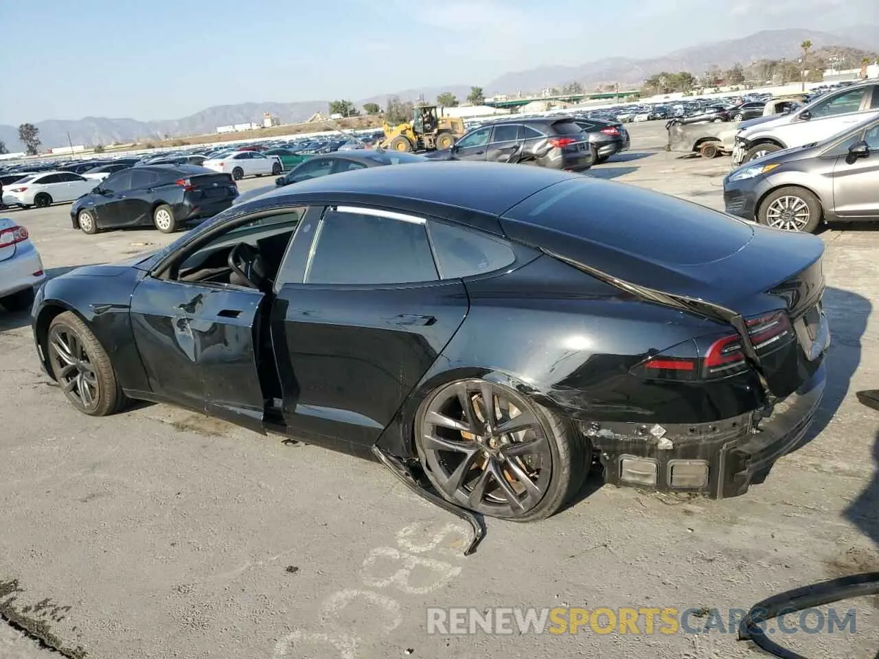 2 fotografías del automóvil dañado 5YJSA1E51NF482745 TESLA MODEL S 2022