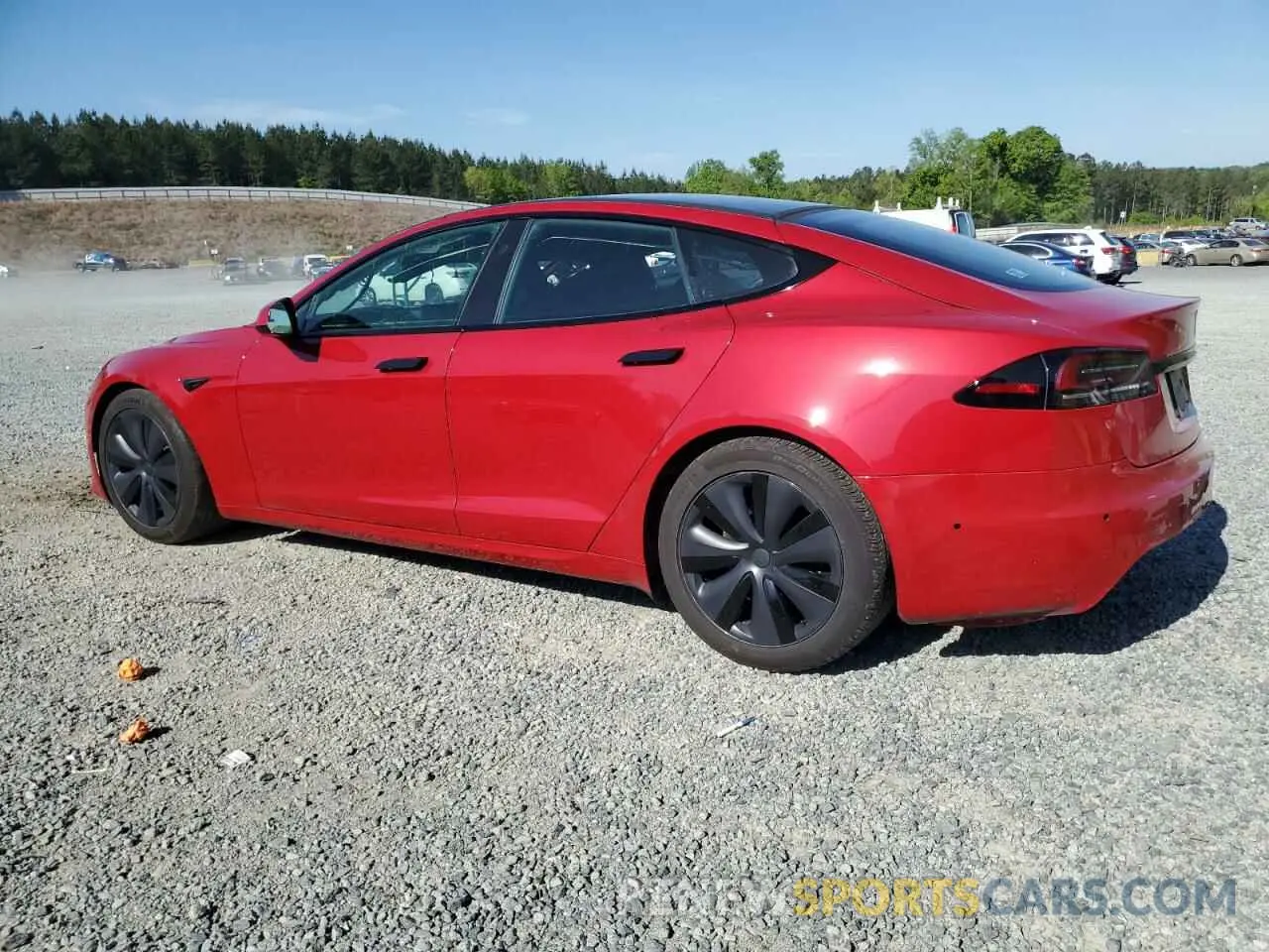 2 fotografías del automóvil dañado 5YJSA1E52NF493799 TESLA MODEL S 2022
