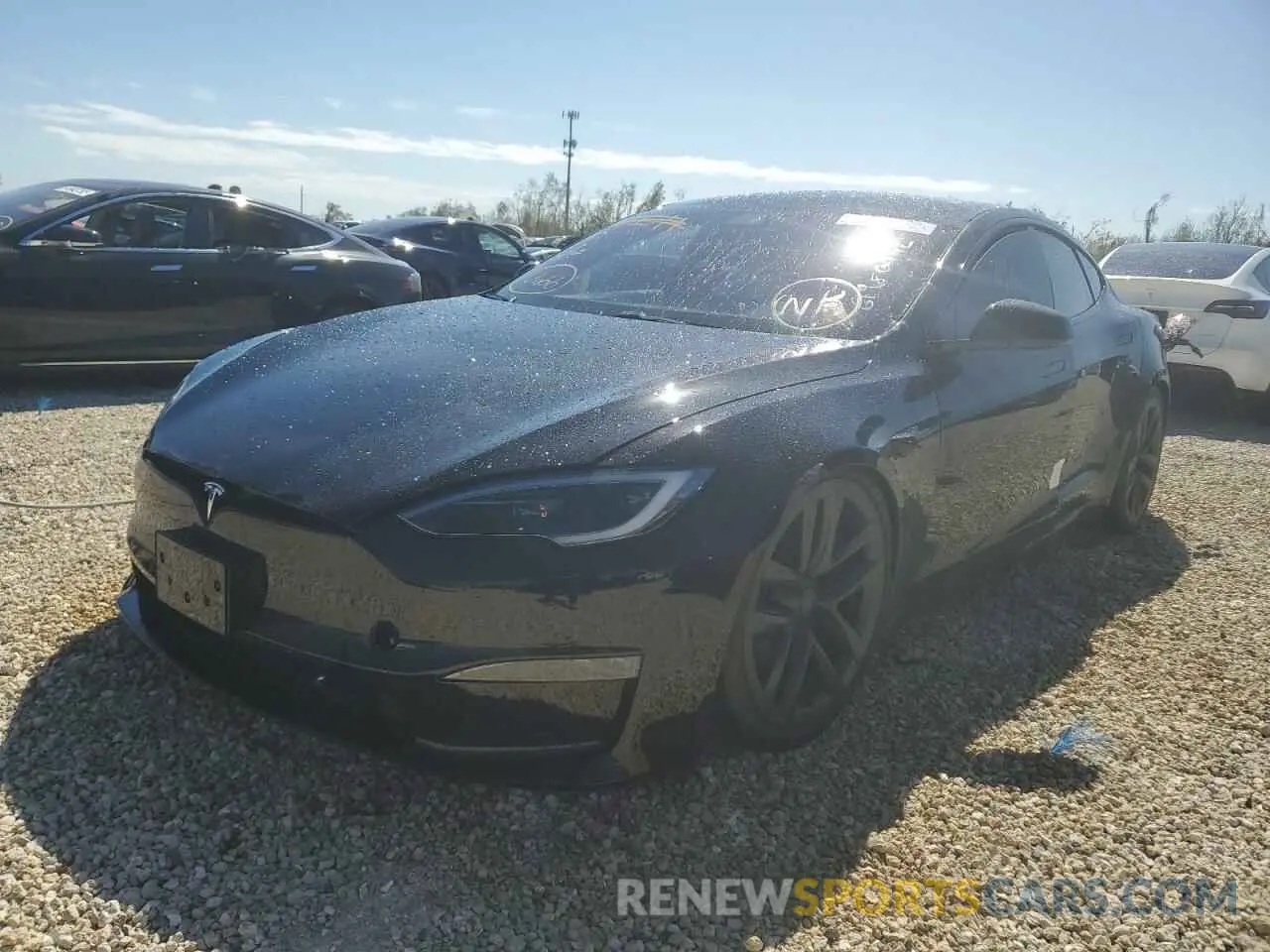 2 fotografías del automóvil dañado 5YJSA1E54NF487020 TESLA MODEL S 2022