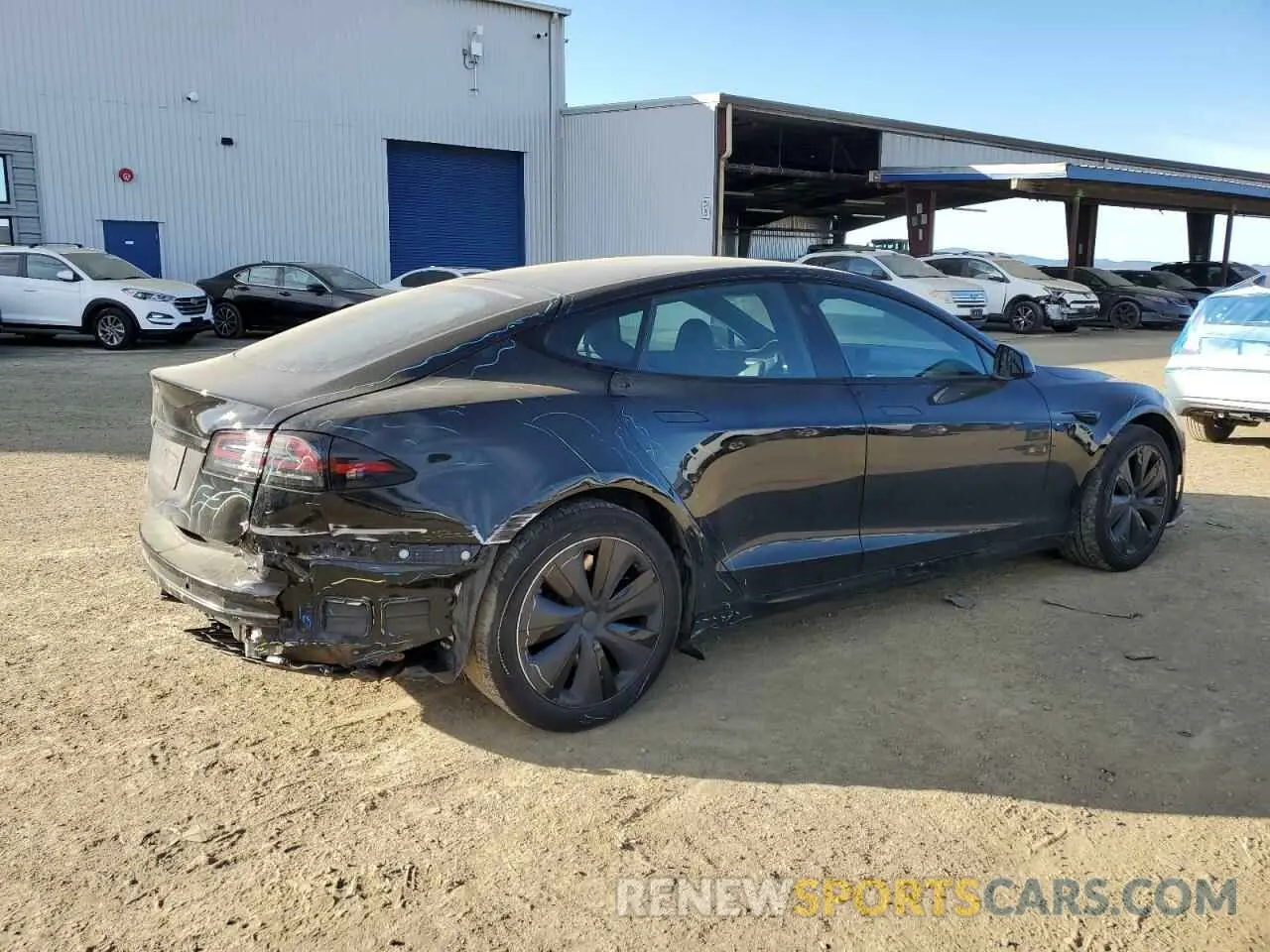 3 fotografías del automóvil dañado 5YJSA1E54NF492329 TESLA MODEL S 2022