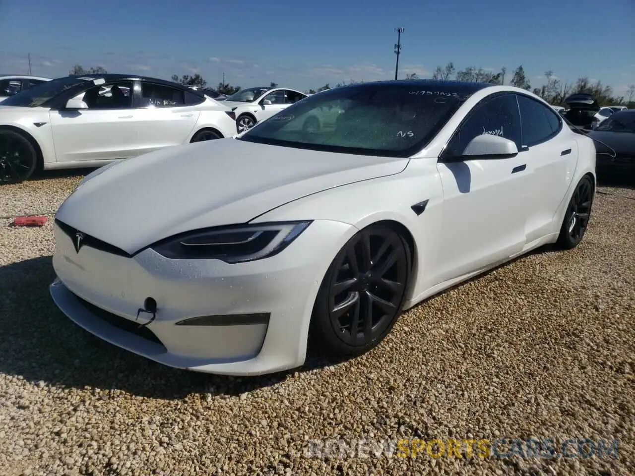 2 fotografías del automóvil dañado 5YJSA1E57NF461348 TESLA MODEL S 2022