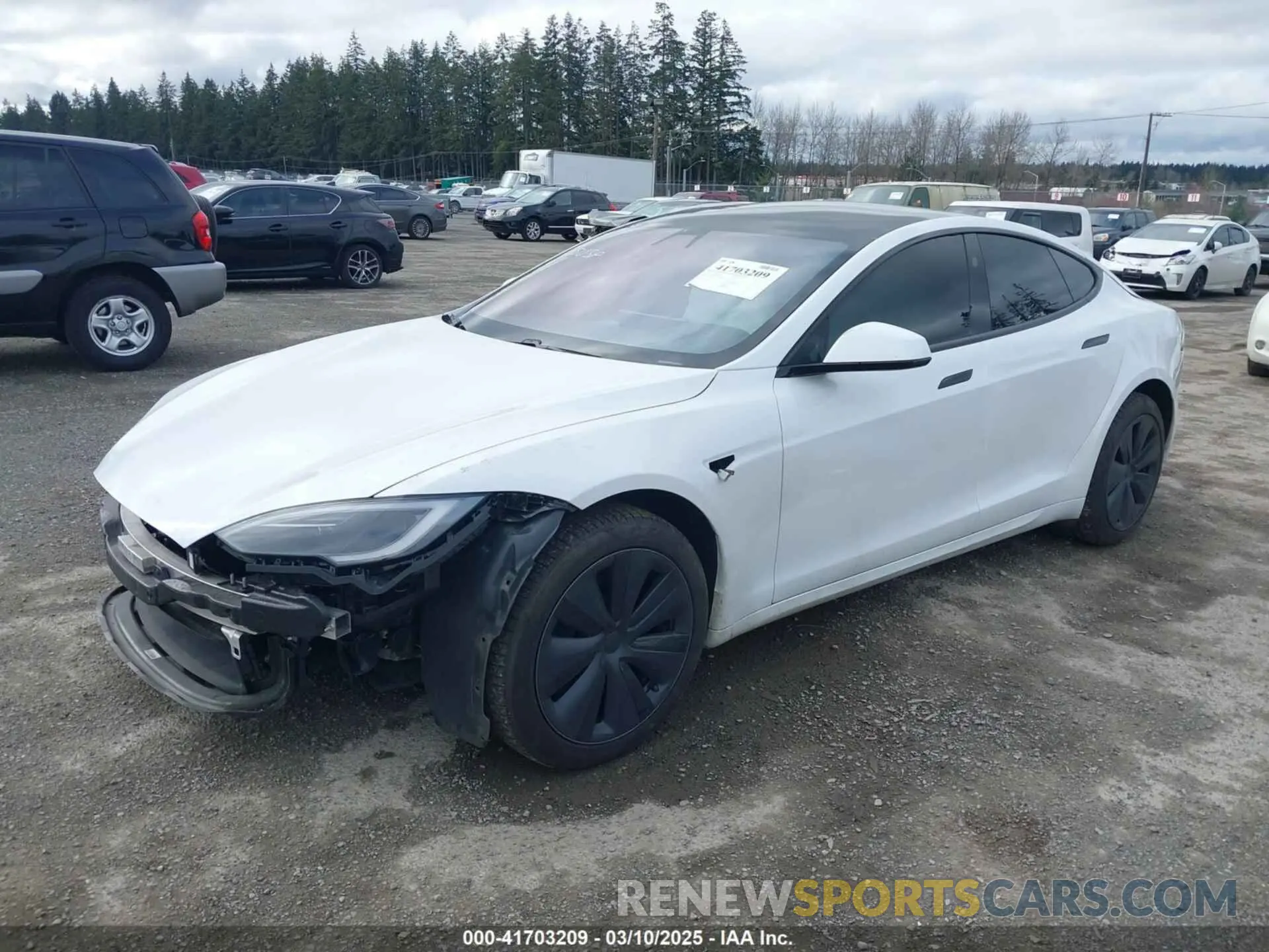2 fotografías del automóvil dañado 5YJSA1E57NF473970 TESLA MODEL S 2022