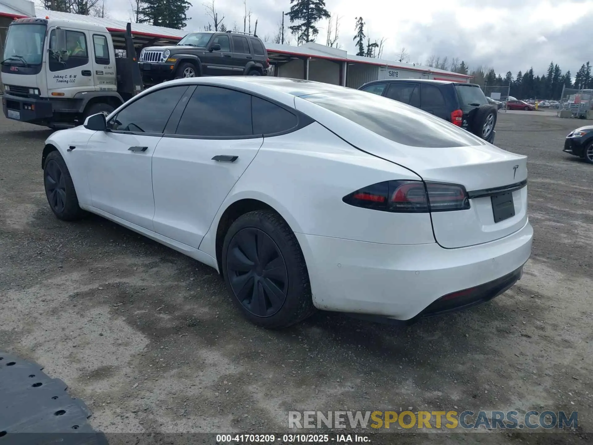 3 fotografías del automóvil dañado 5YJSA1E57NF473970 TESLA MODEL S 2022