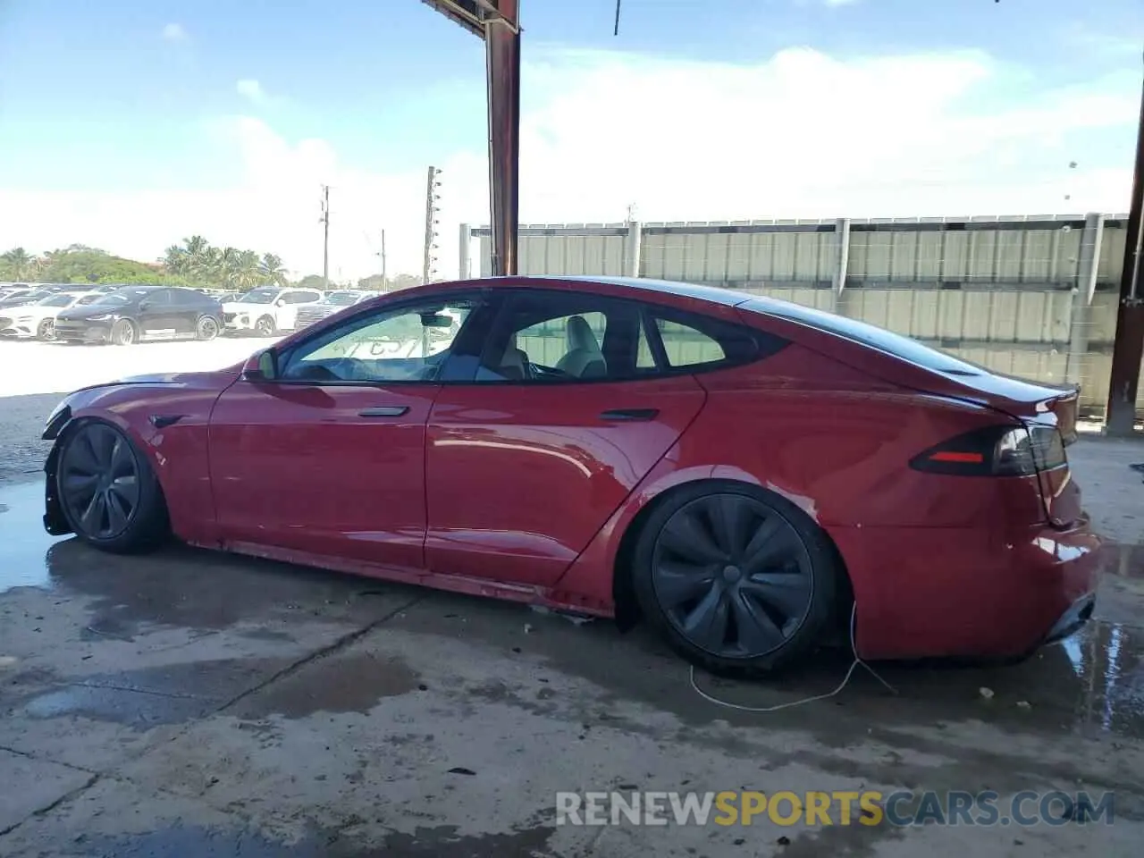 2 fotografías del automóvil dañado 5YJSA1E64NF473840 TESLA MODEL S 2022