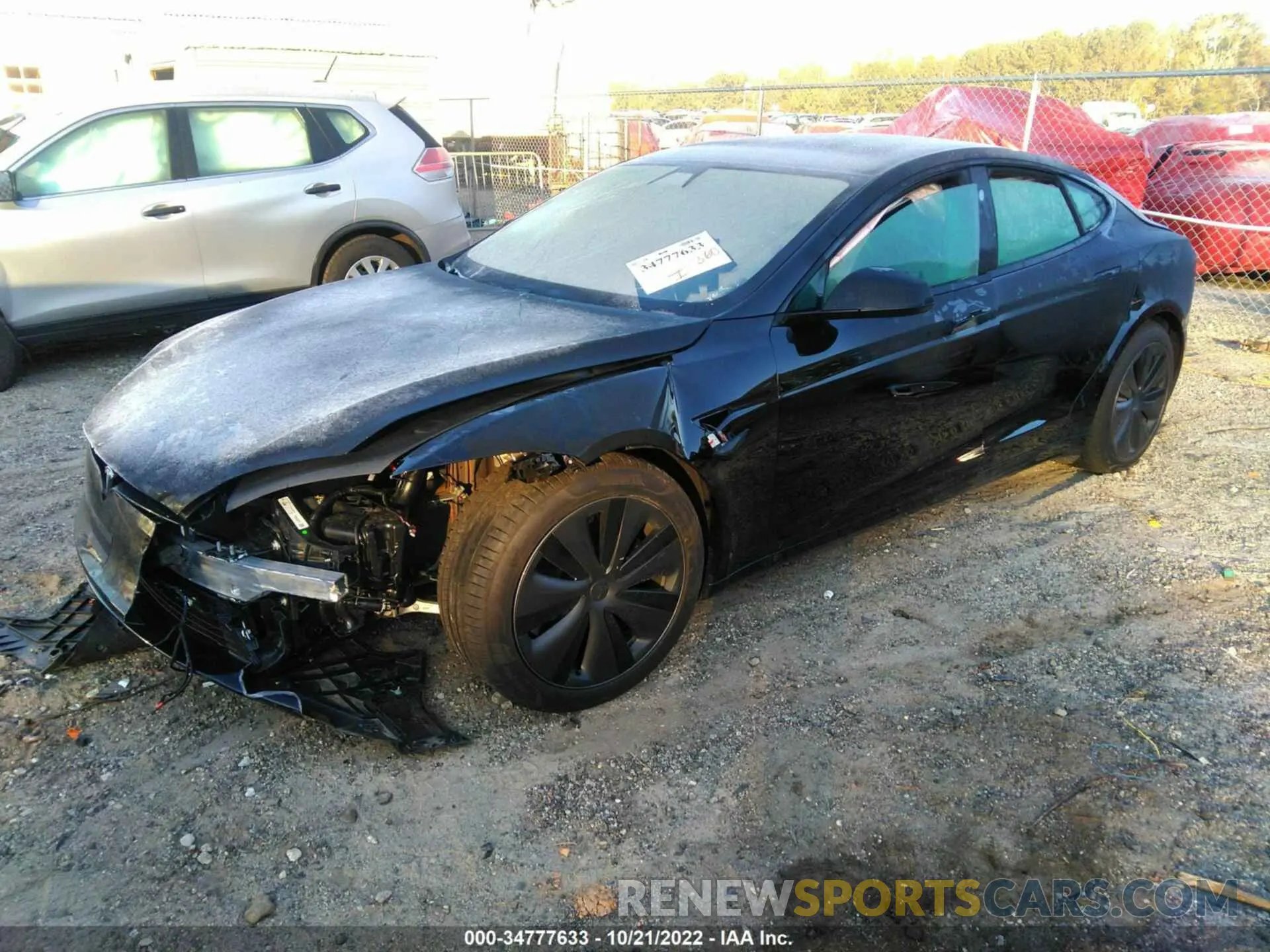 2 fotografías del automóvil dañado 5YJSA1E65NF479159 TESLA MODEL S 2022