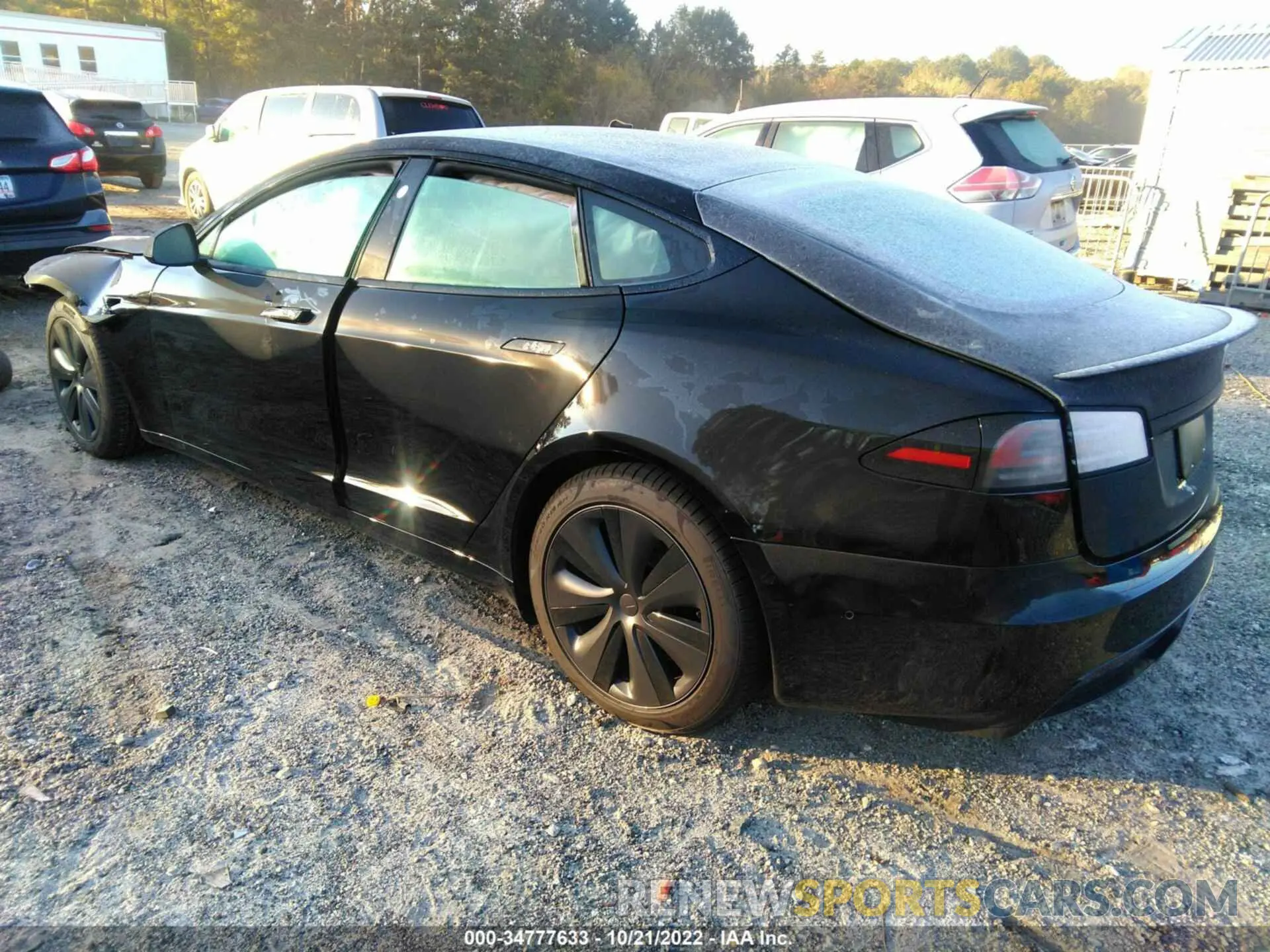 3 fotografías del automóvil dañado 5YJSA1E65NF479159 TESLA MODEL S 2022