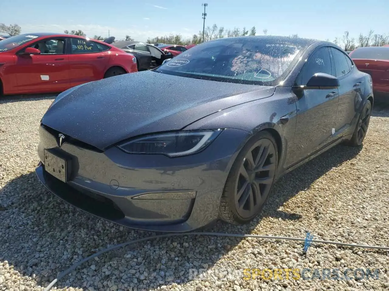 2 fotografías del automóvil dañado 5YJSA1E67NF473699 TESLA MODEL S 2022