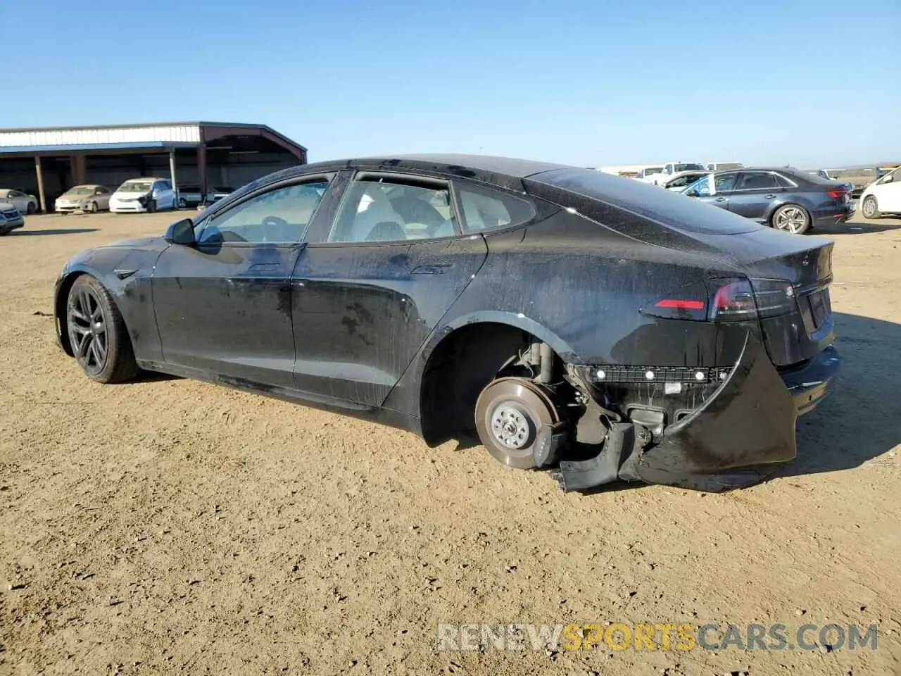 2 fotografías del automóvil dañado 5YJSA1E52PF499802 TESLA MODEL S 2023