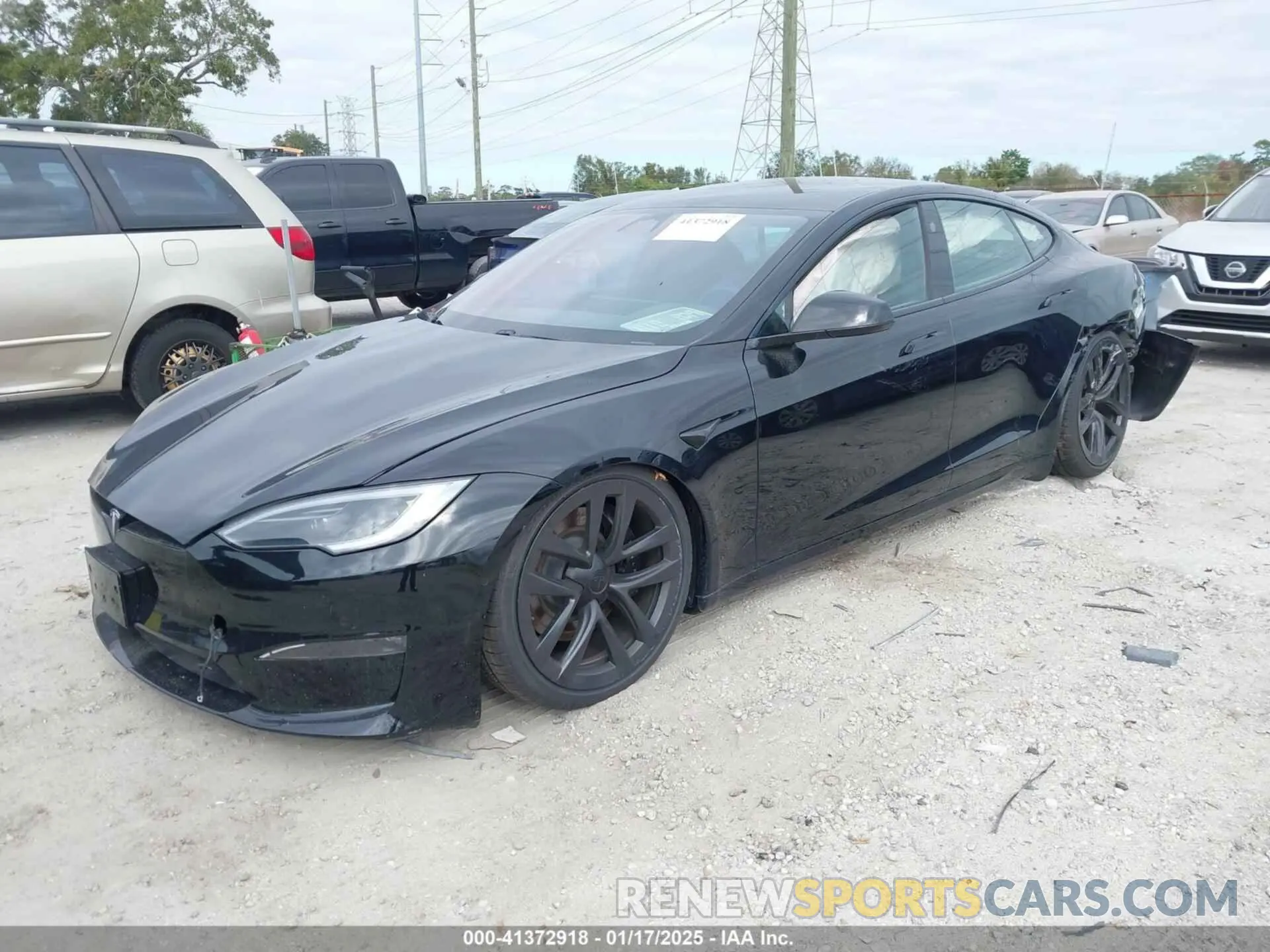 2 fotografías del automóvil dañado 5YJSA1E52PF500088 TESLA MODEL S 2023