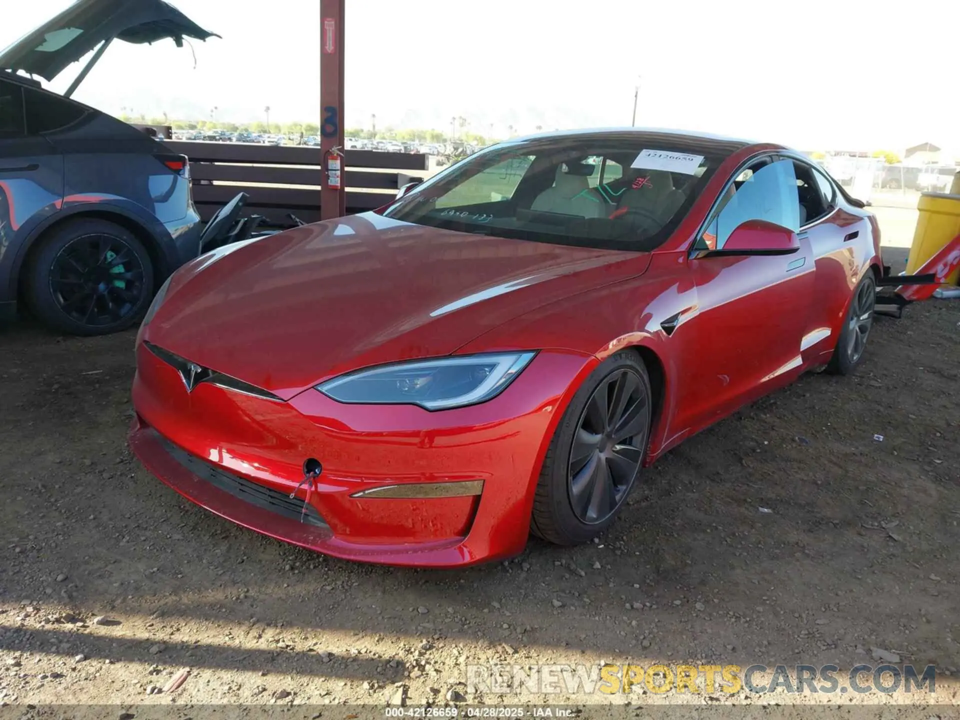 2 fotografías del automóvil dañado 5YJSA1E55PF513708 TESLA MODEL S 2023