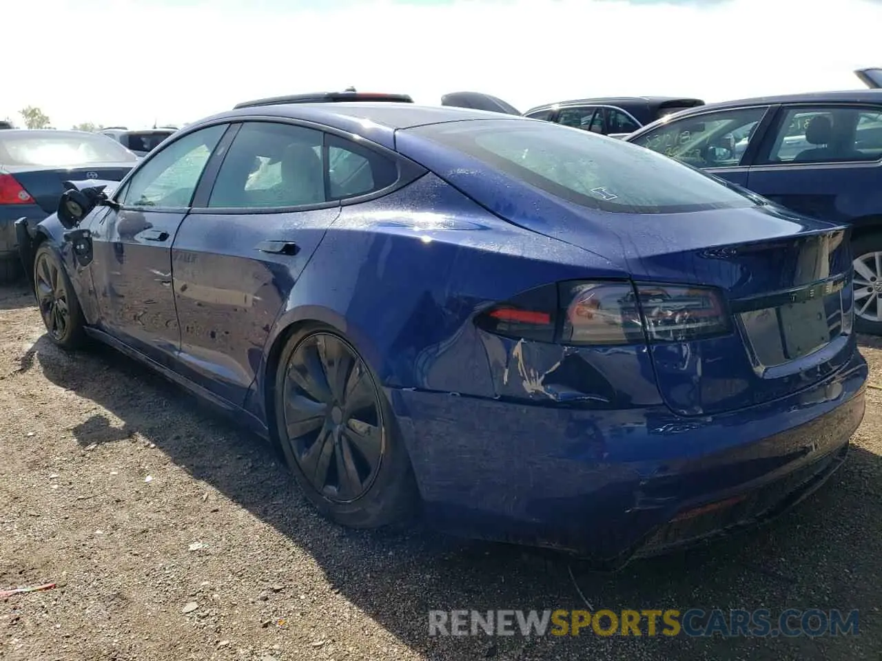 2 fotografías del automóvil dañado 5YJSA1E56PF513152 TESLA MODEL S 2023