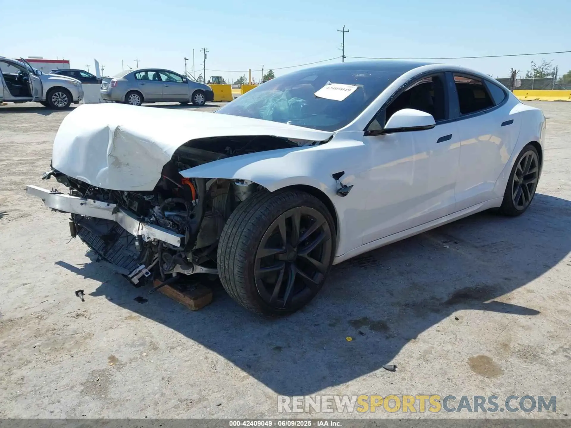 2 fotografías del automóvil dañado 5YJSA1E59PF500816 TESLA MODEL S 2023