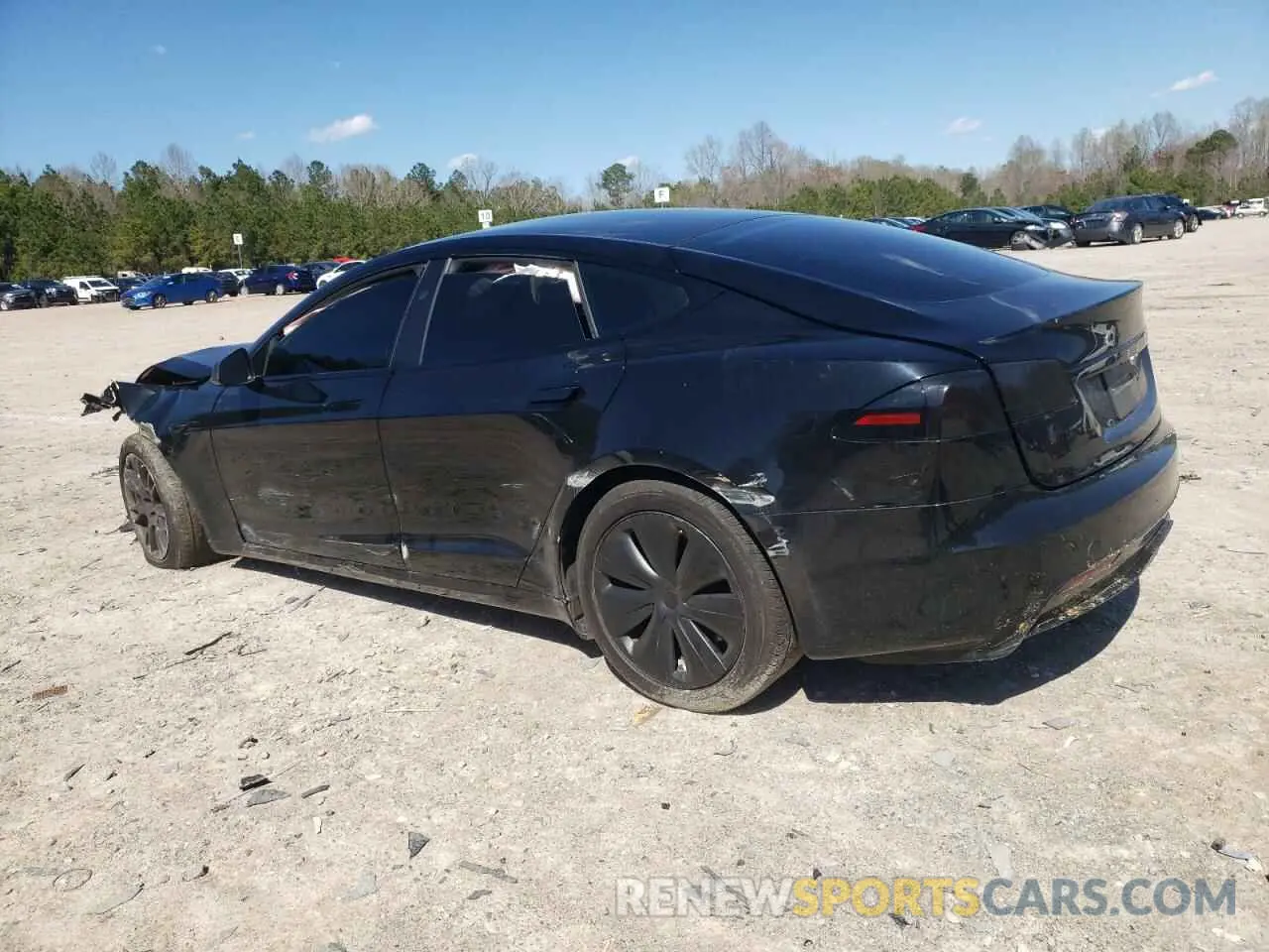 2 fotografías del automóvil dañado 5YJSA1E59PF526333 TESLA MODEL S 2023