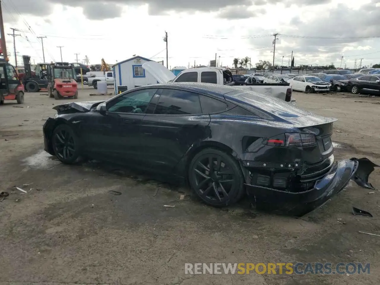 2 fotografías del automóvil dañado 5YJSA1E63PF498778 TESLA MODEL S 2023