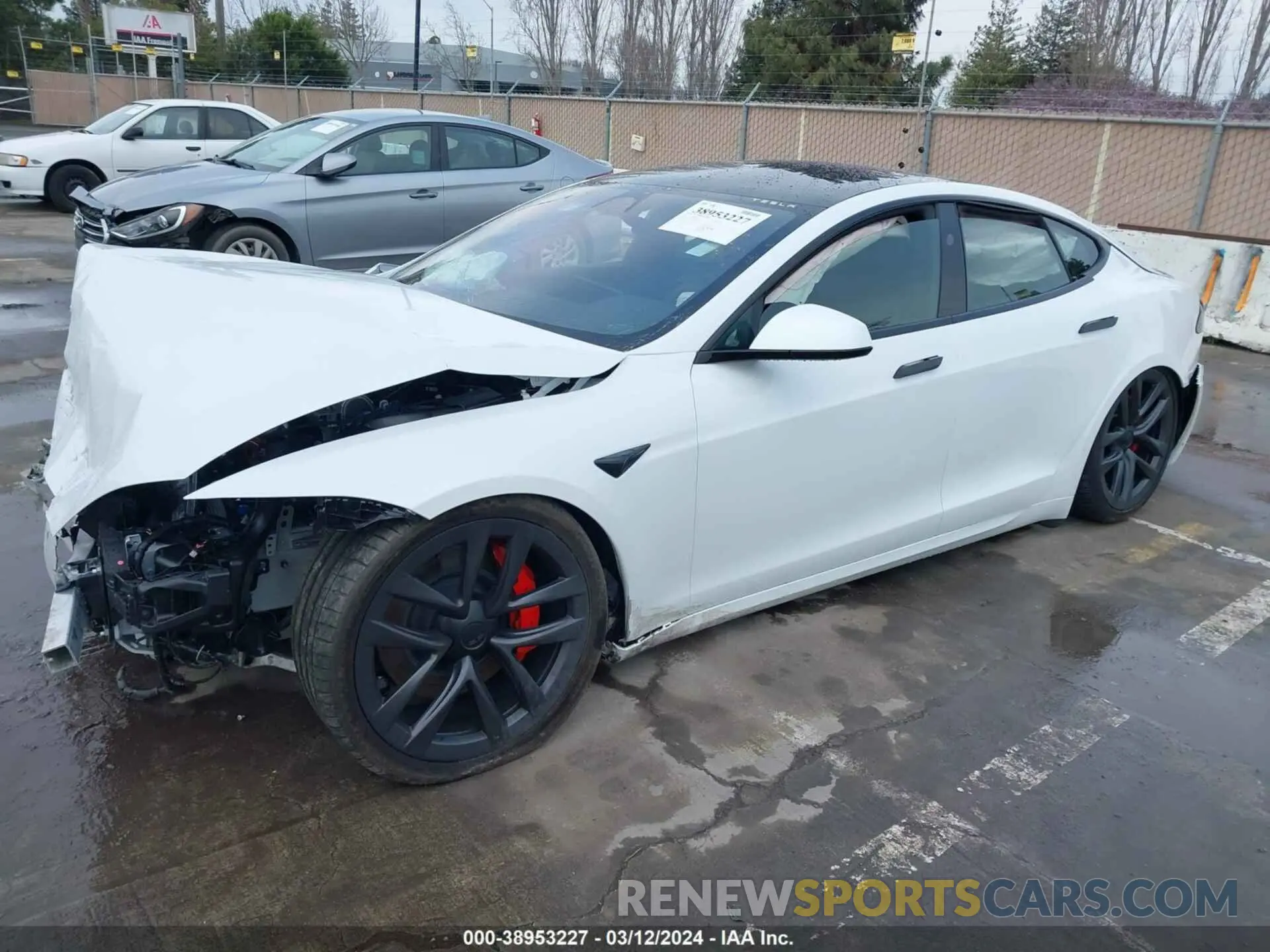 2 fotografías del automóvil dañado 5YJSA1E69PF521920 TESLA MODEL S 2023