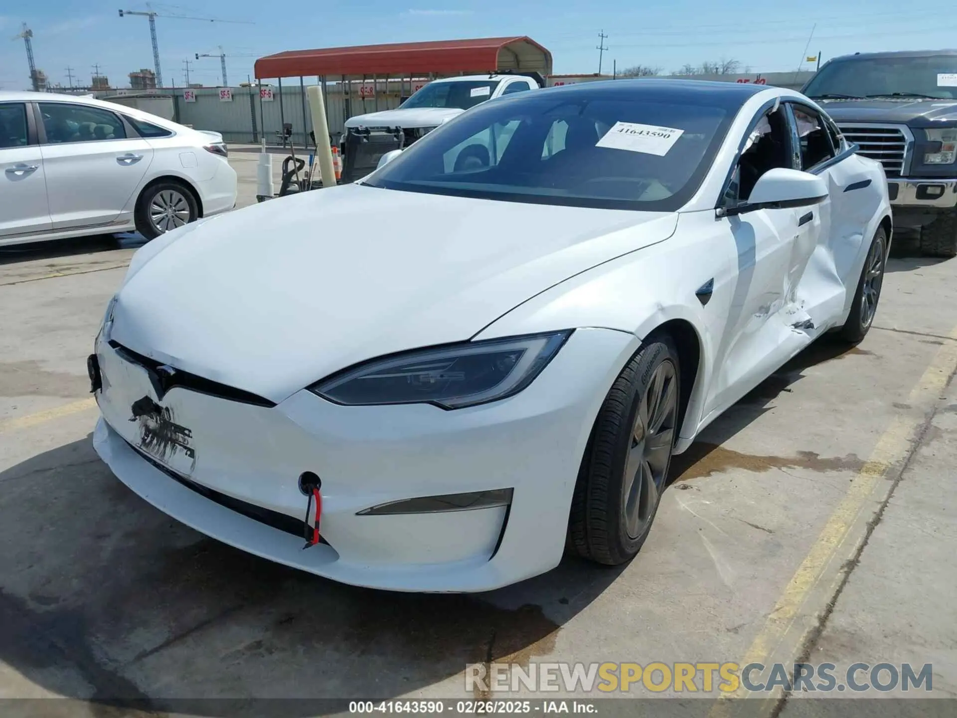2 fotografías del automóvil dañado 5YJSA1E52RF538021 TESLA MODEL S 2024