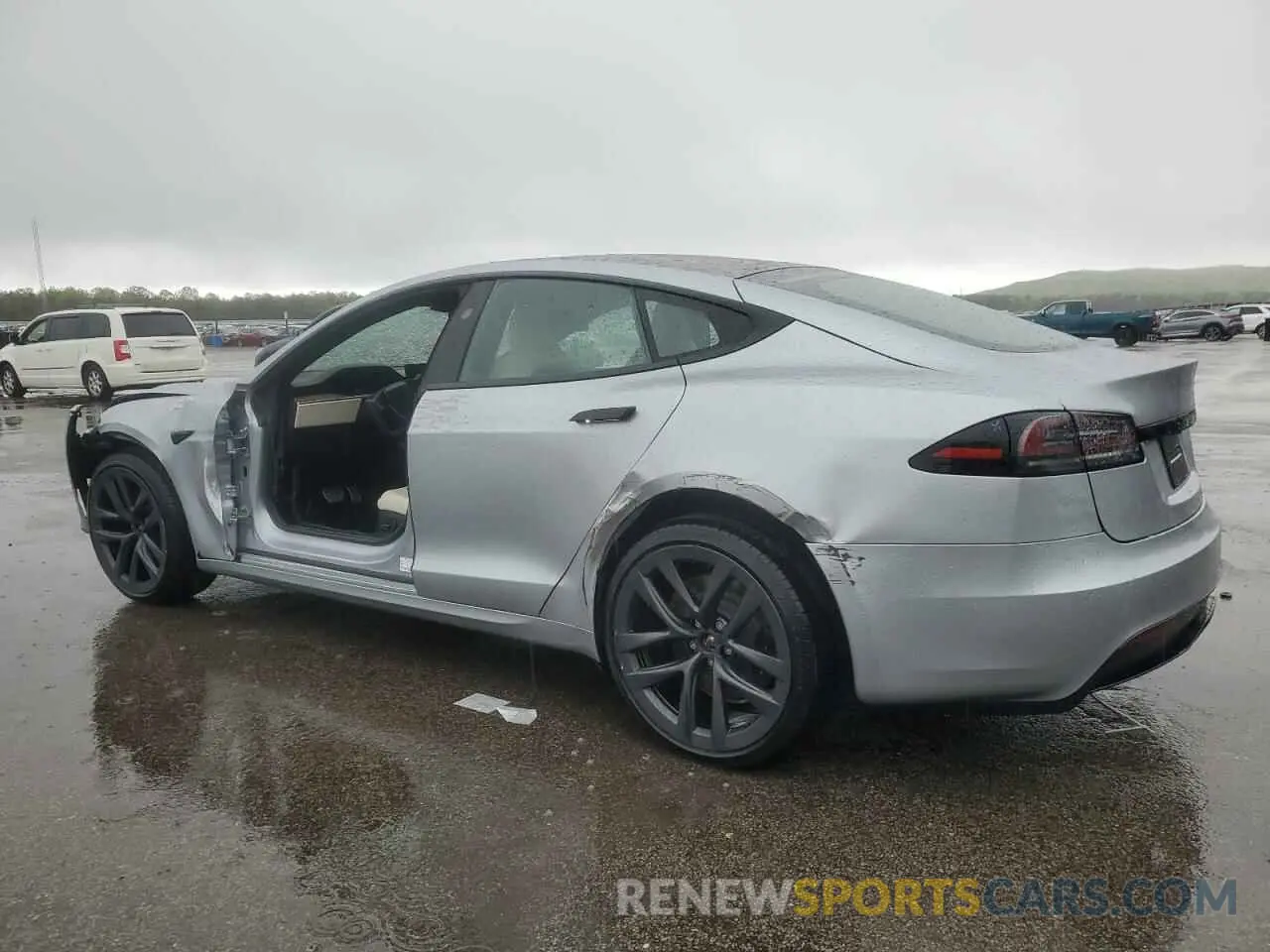 2 fotografías del automóvil dañado 5YJSA1E53RF542174 TESLA MODEL S 2024