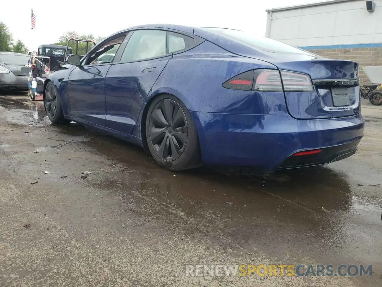 2 fotografías del automóvil dañado 5YJSA1E59SF550219 TESLA MODEL S 2025