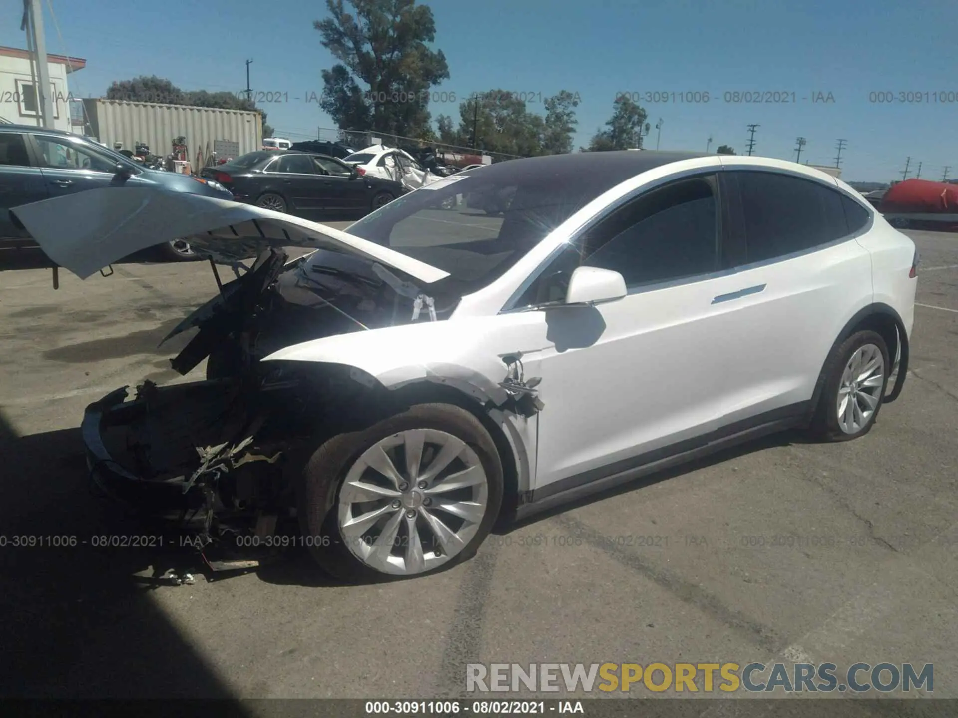 2 fotografías del automóvil dañado 5YJXCAE21LF235891 TESLA MODEL X 2020
