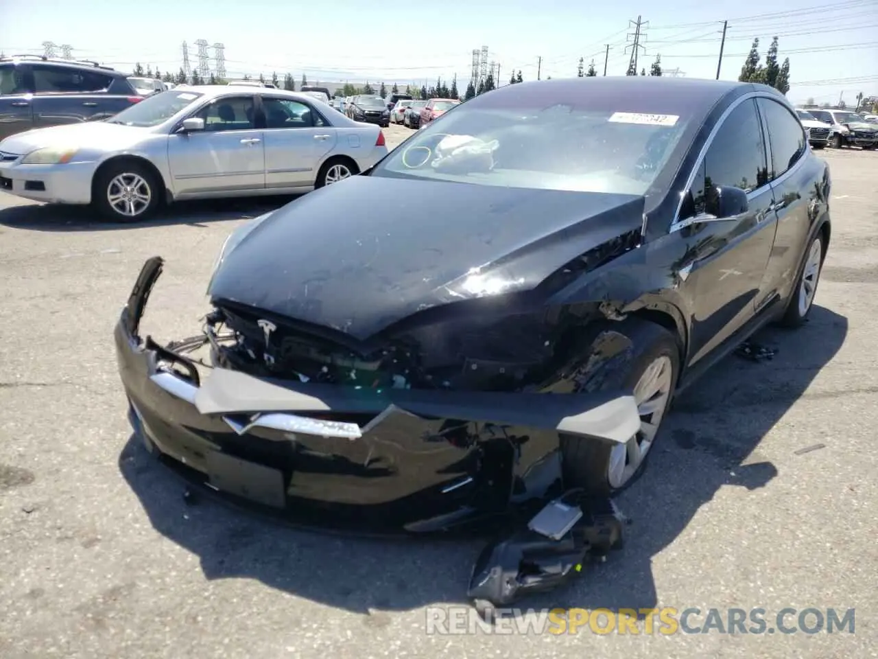 2 fotografías del automóvil dañado 5YJXCAE29LF240904 TESLA MODEL X 2020