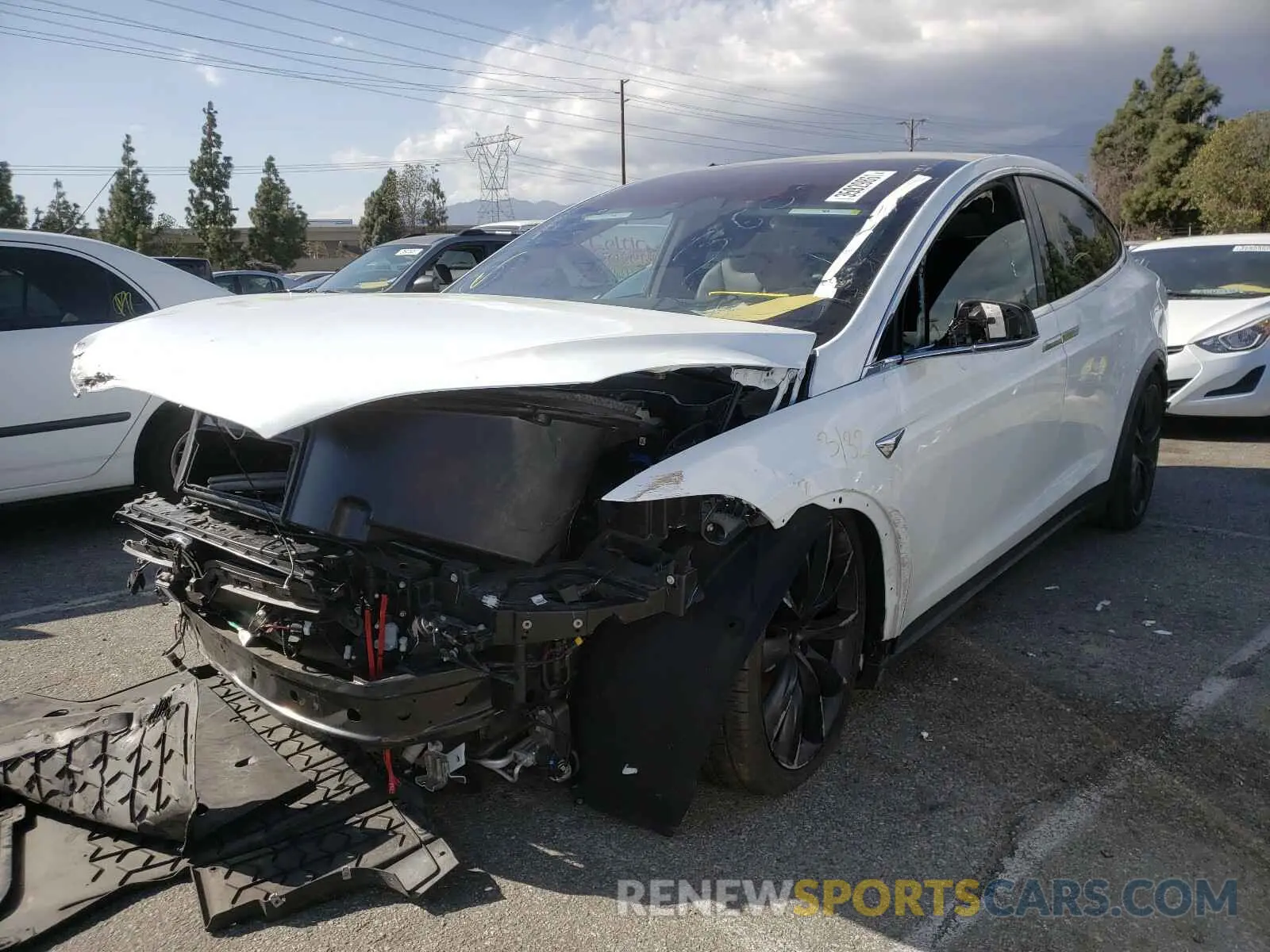 2 fotografías del automóvil dañado 5YJXCBE20LF242014 TESLA MODEL X 2020