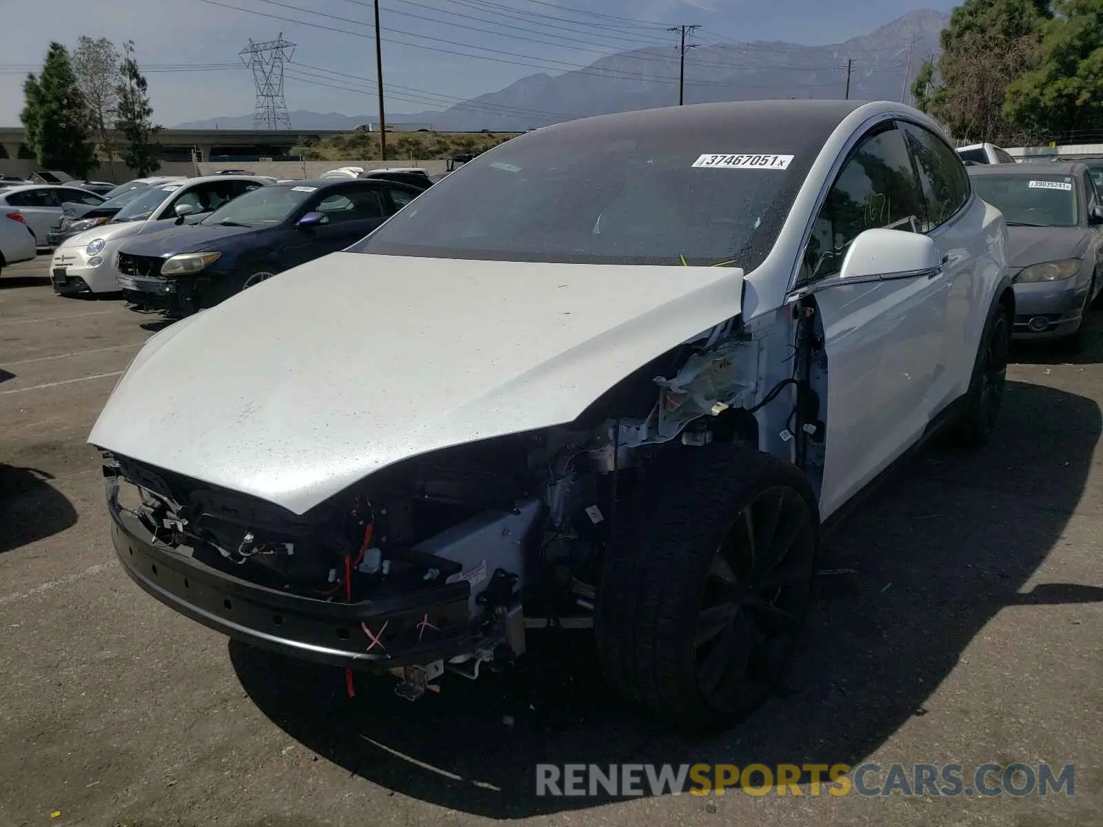 2 fotografías del automóvil dañado 5YJXCBE20LF268418 TESLA MODEL X 2020