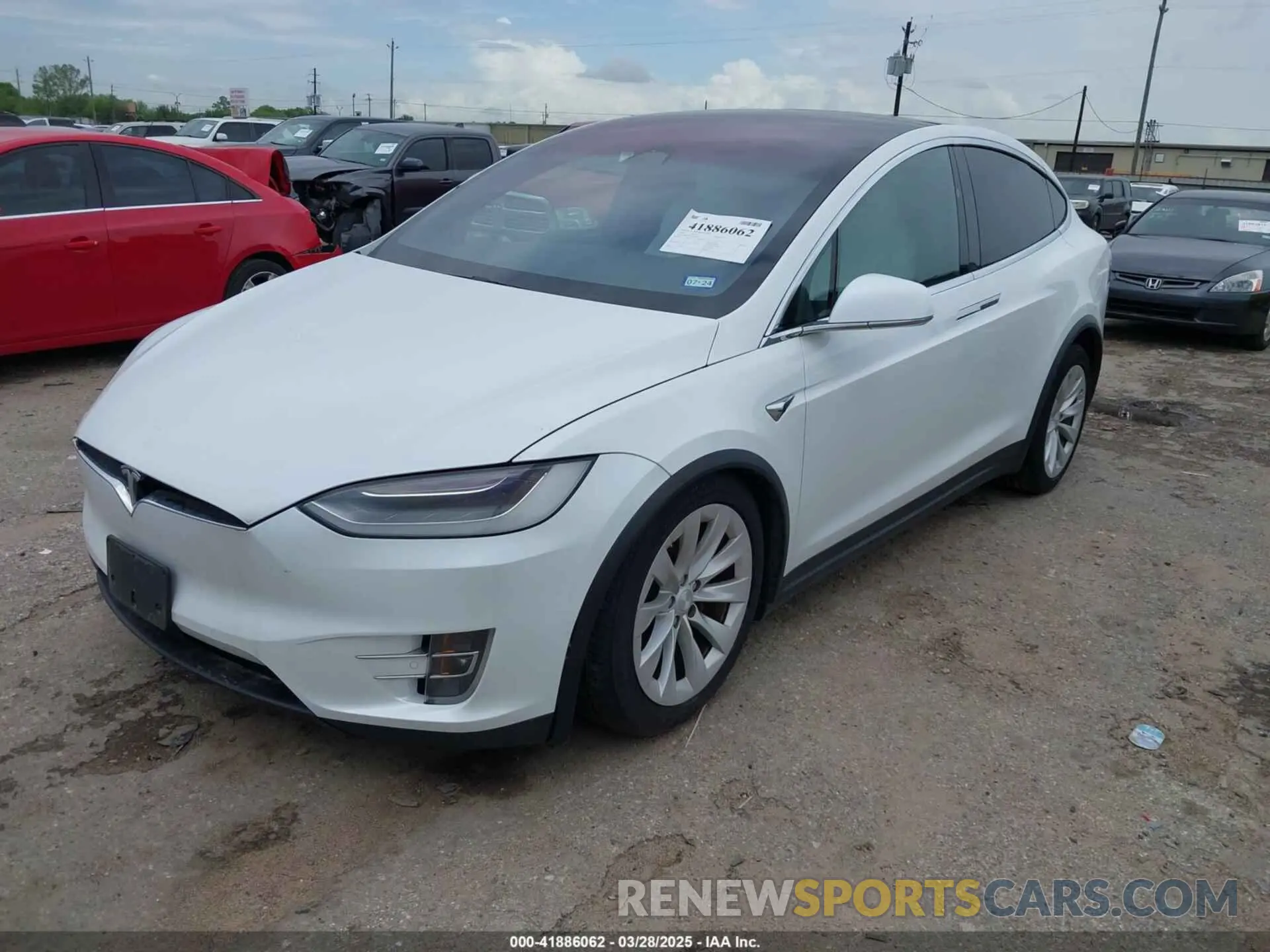 2 fotografías del automóvil dañado 5YJXCBE23LF233484 TESLA MODEL X 2020