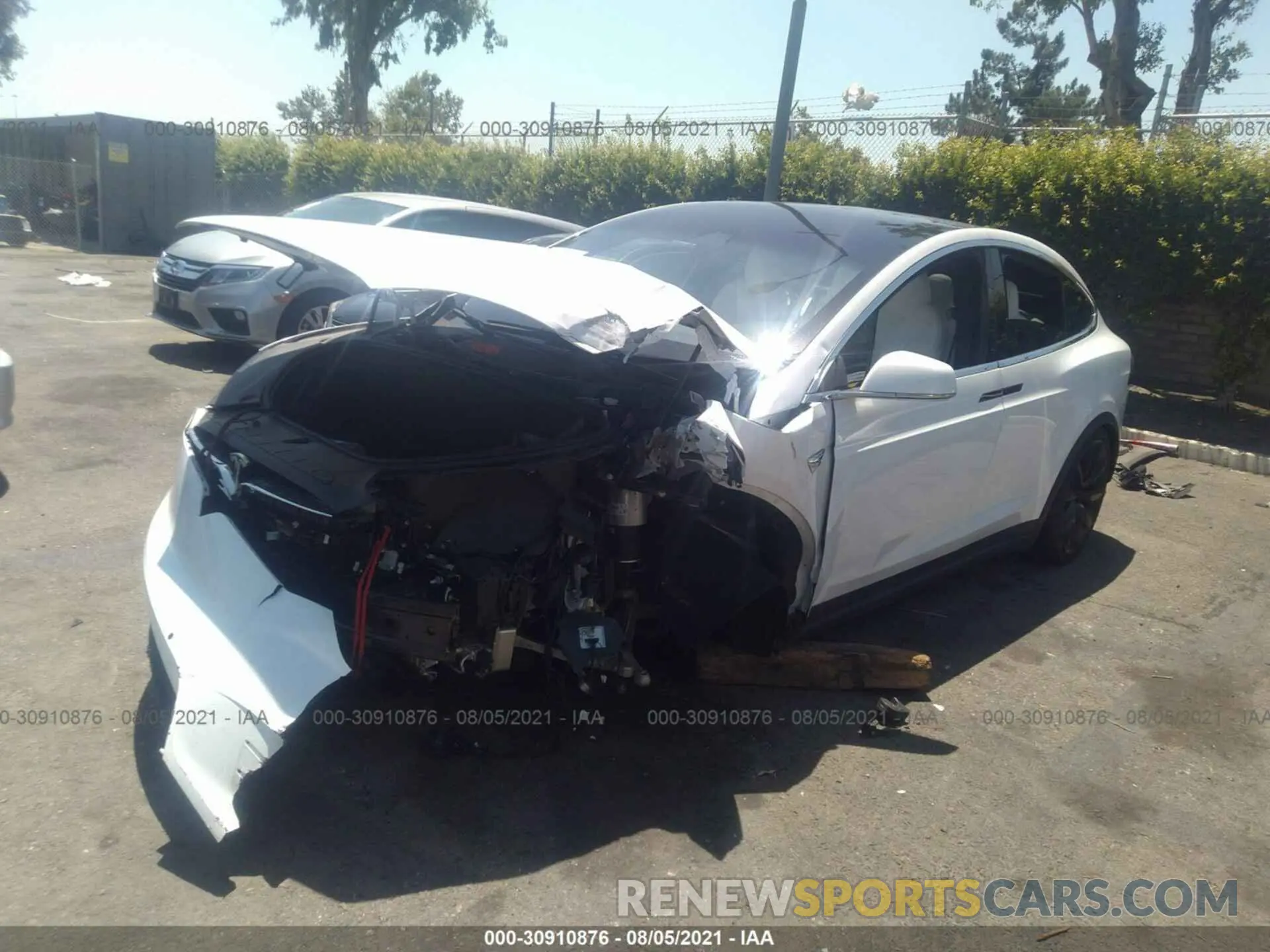 2 fotografías del automóvil dañado 5YJXCBE2XLF304793 TESLA MODEL X 2020