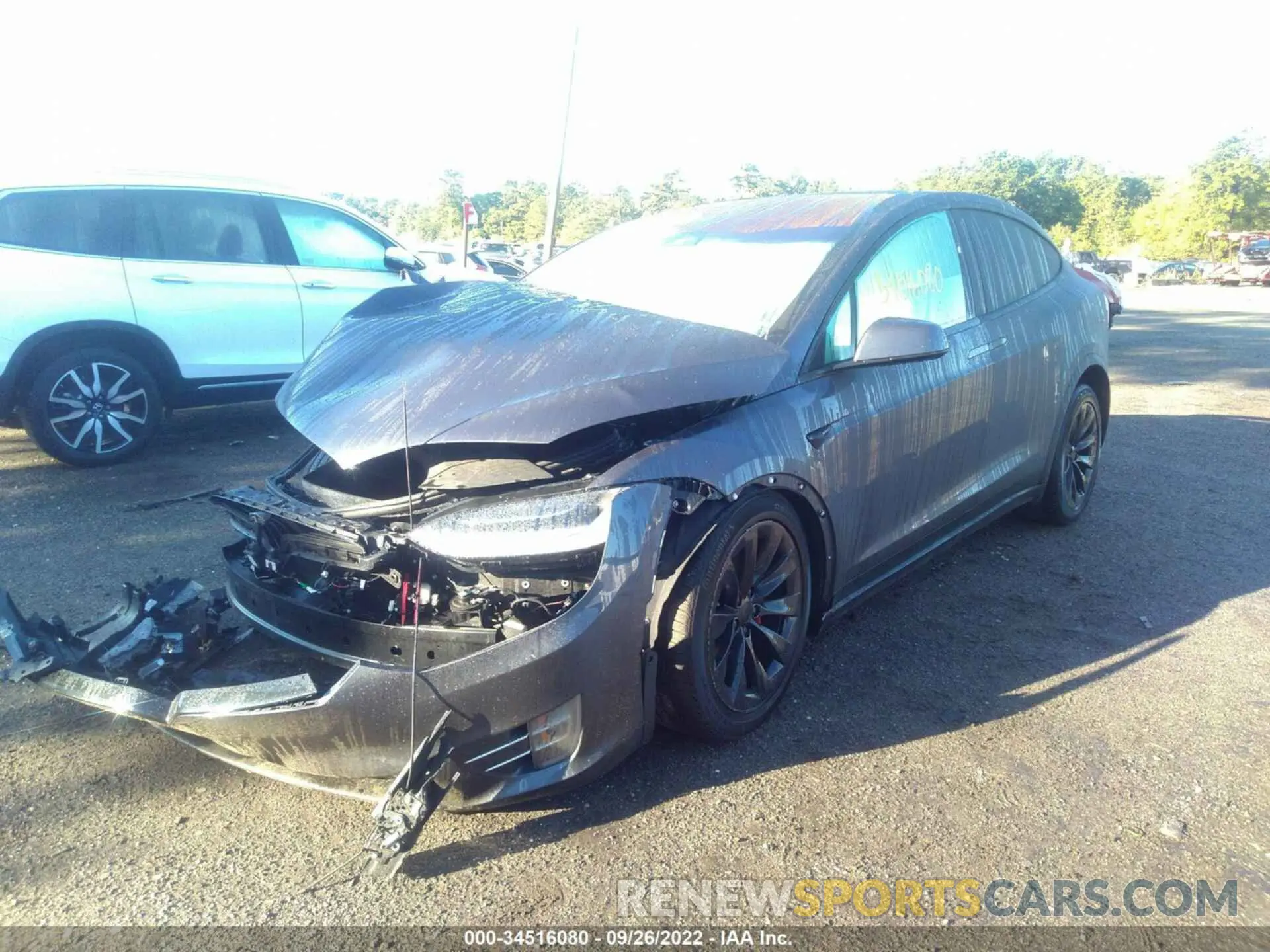 2 fotografías del automóvil dañado 5YJXCDE27LF231345 TESLA MODEL X 2020