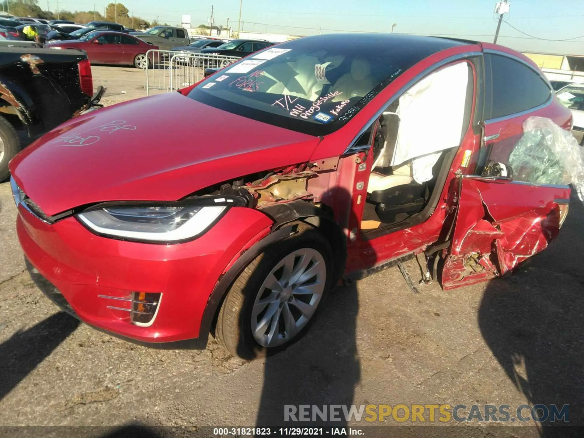 2 fotografías del automóvil dañado 5YJXCAE20MF312946 TESLA MODEL X 2021