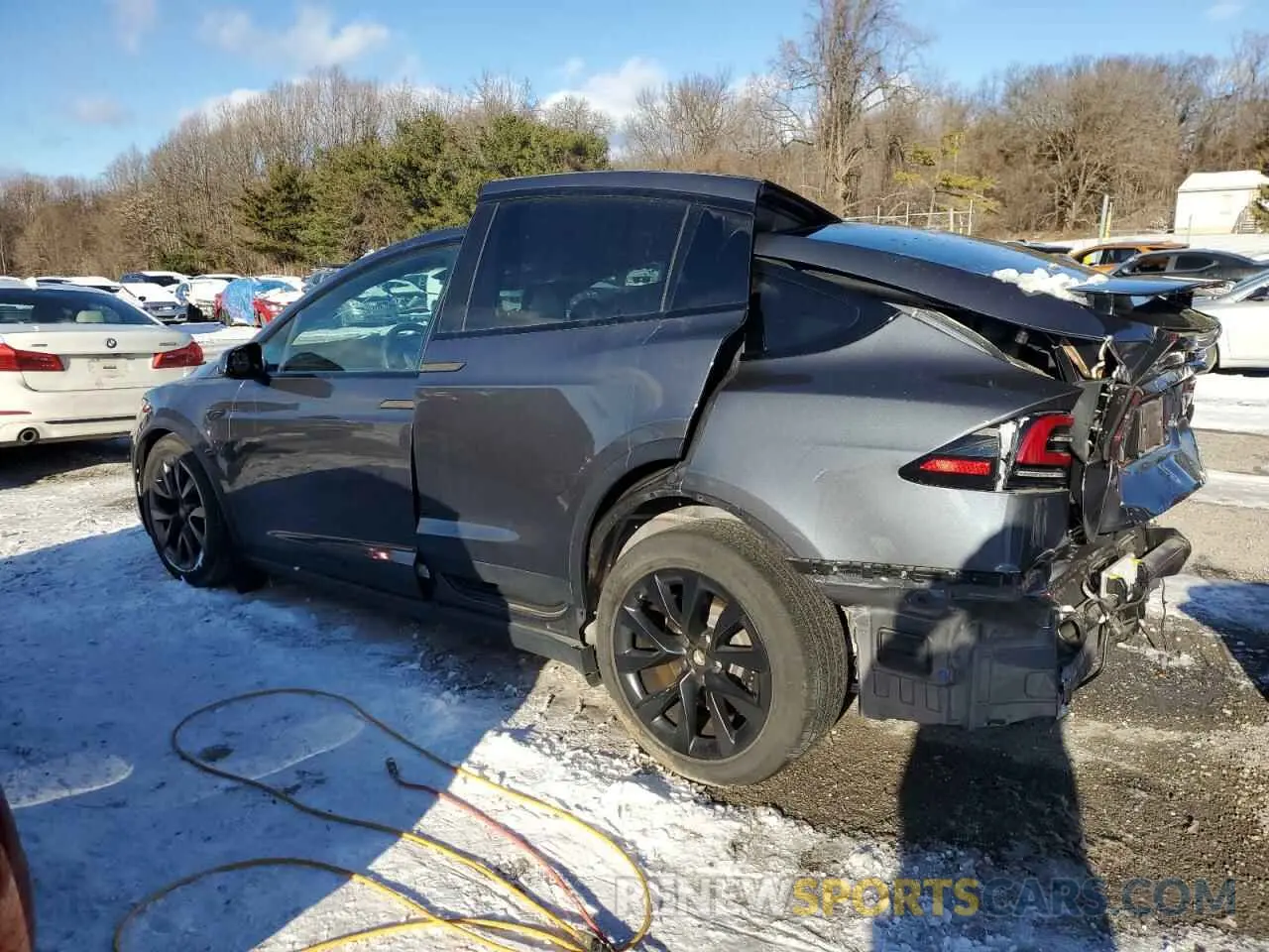 2 fotografías del automóvil dañado 7SAXCAE57PF396944 TESLA MODEL X 2023