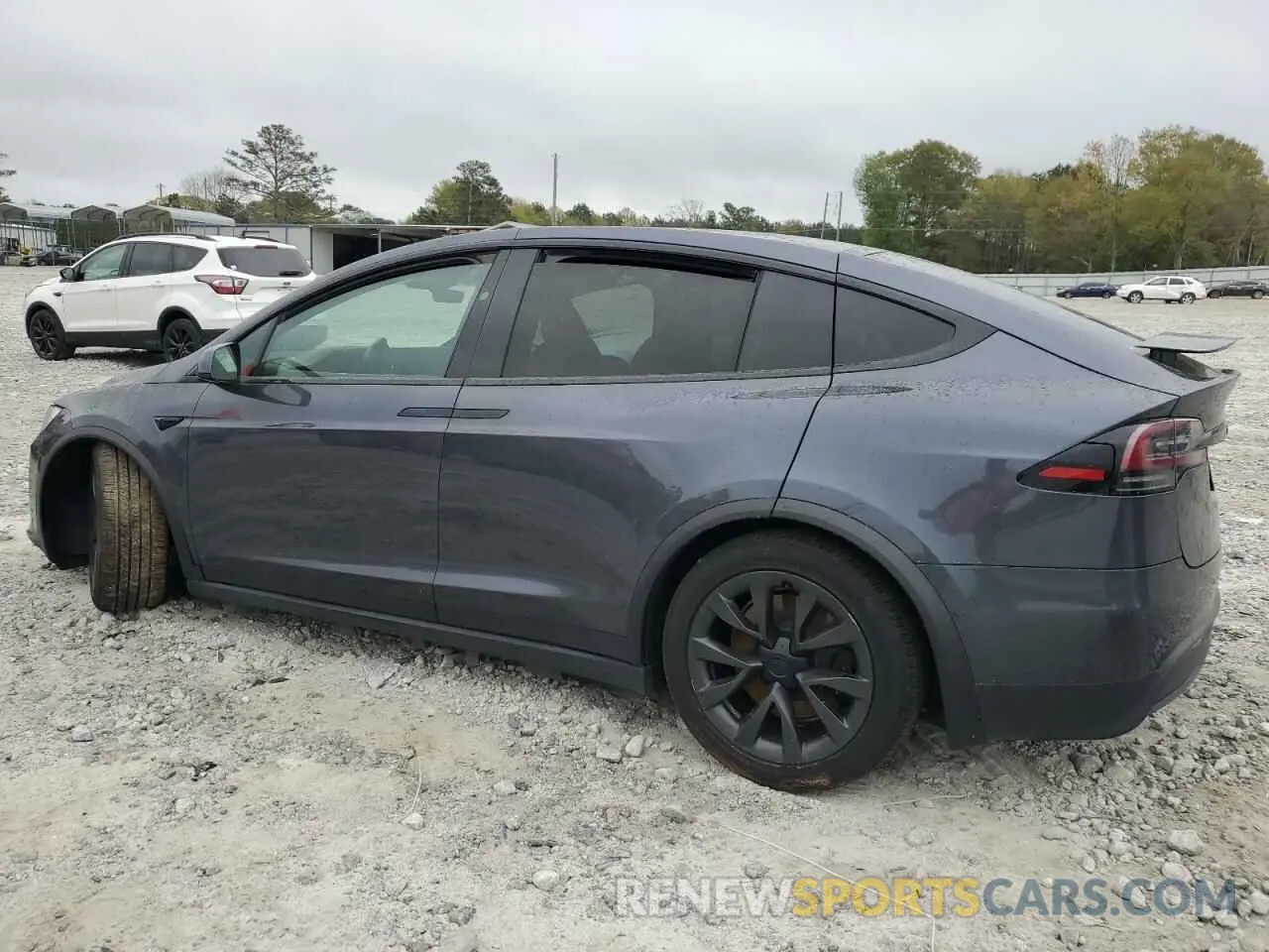 2 fotografías del automóvil dañado 7SAXCAE58PF373852 TESLA MODEL X 2023