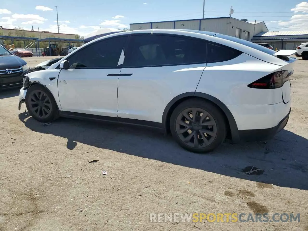 2 fotografías del automóvil dañado 7SAXCAE58PF428218 TESLA MODEL X 2023