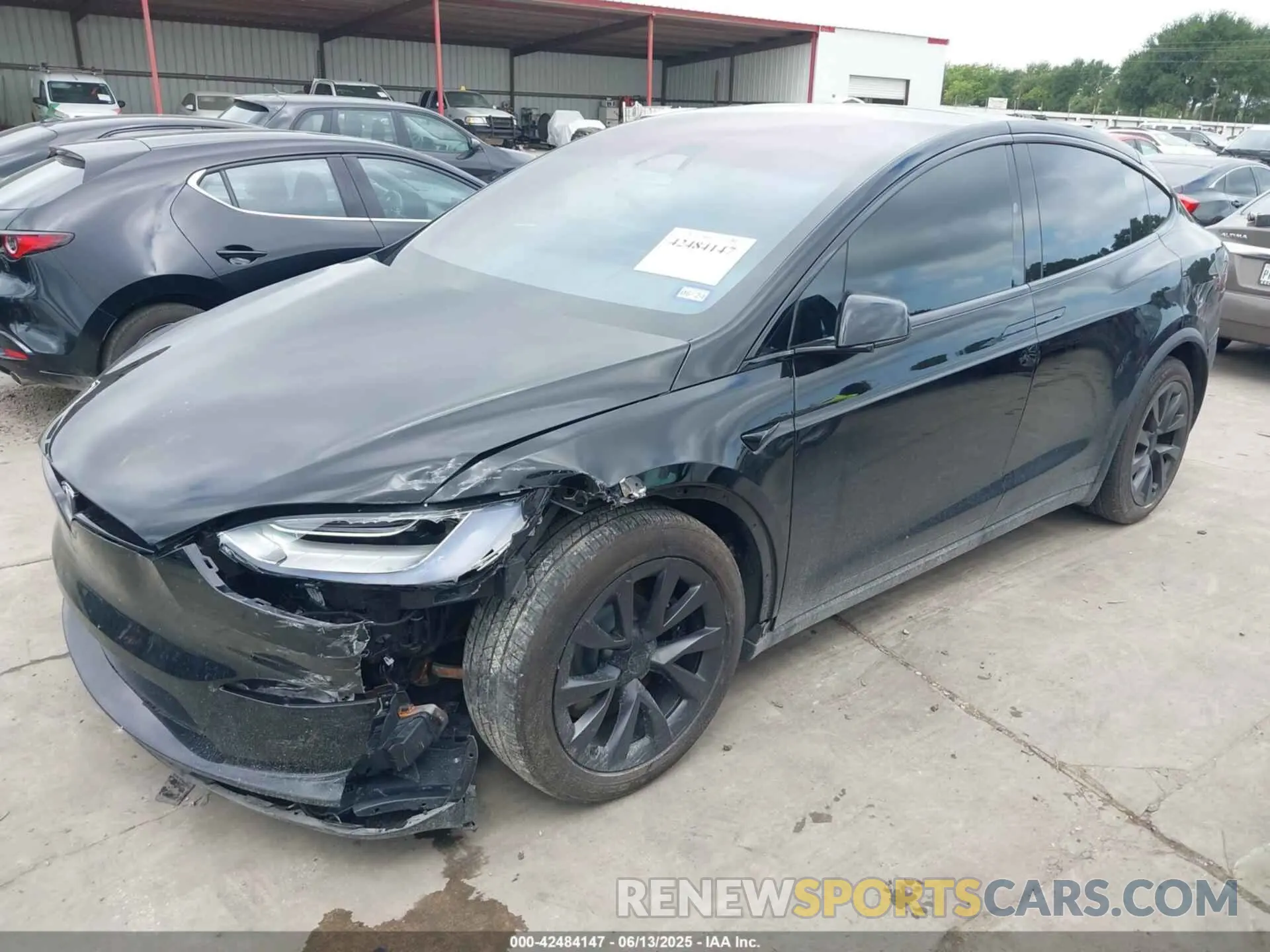 2 fotografías del automóvil dañado 7SAXCAE59PF400623 TESLA MODEL X 2023