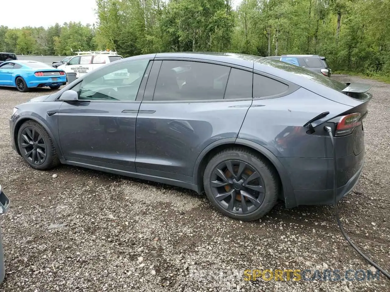 2 fotografías del automóvil dañado 7SAXCBE50PF374581 TESLA MODEL X 2023