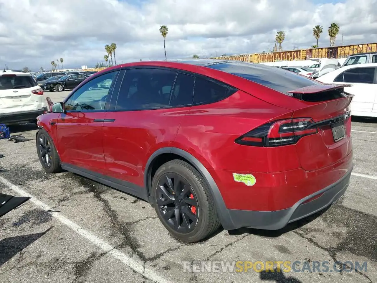 2 fotografías del automóvil dañado 7SAXCBE66PF404126 TESLA MODEL X 2023