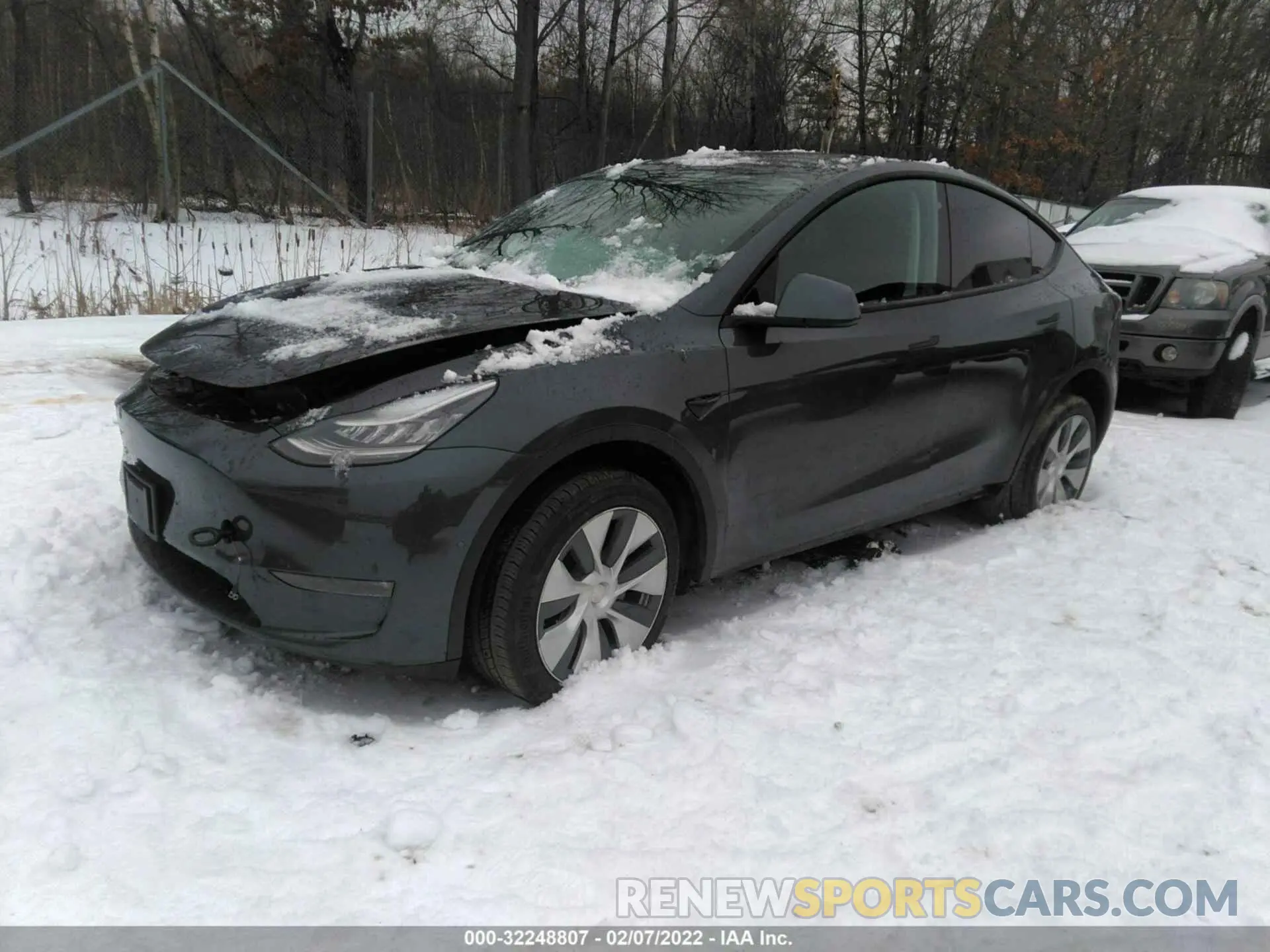 2 fotografías del automóvil dañado 5YJYGDEE0LF048002 TESLA MODEL Y 2020