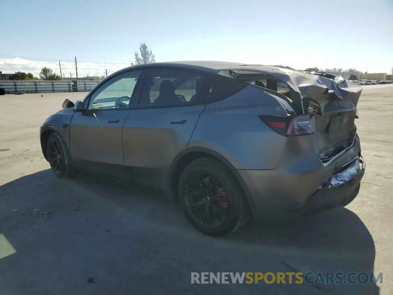 2 fotografías del automóvil dañado 5YJYGDEE1LF013288 TESLA MODEL Y 2020