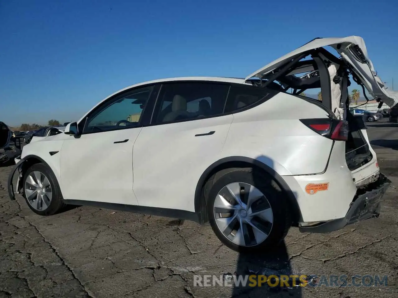 2 fotografías del automóvil dañado 5YJYGDEE1LF017728 TESLA MODEL Y 2020