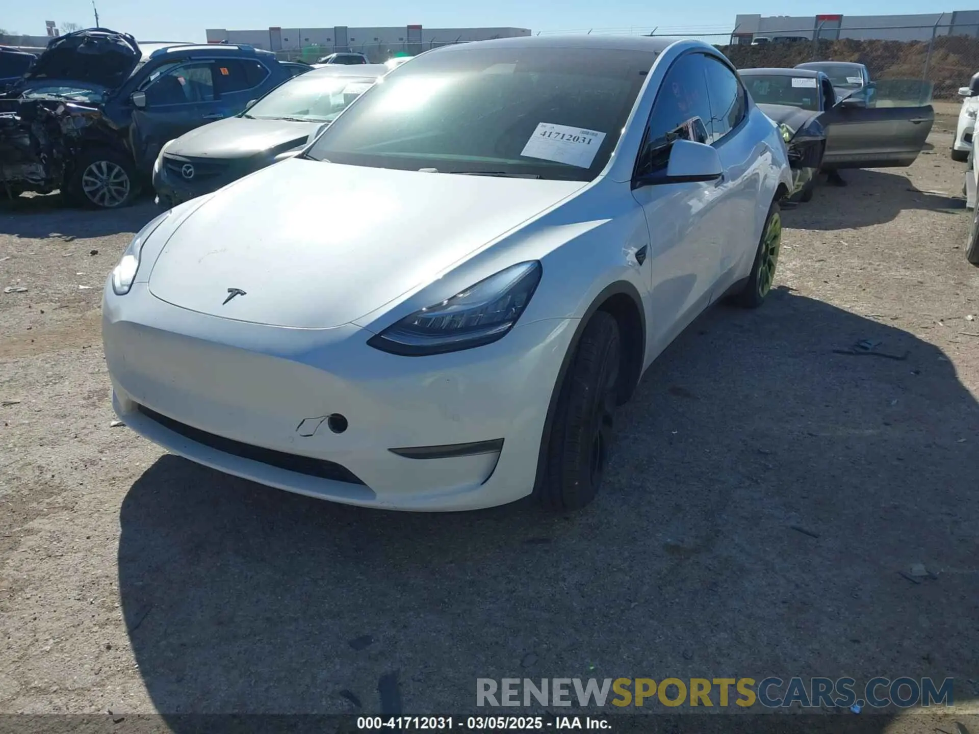 2 fotografías del automóvil dañado 5YJYGDEE1LF044251 TESLA MODEL Y 2020