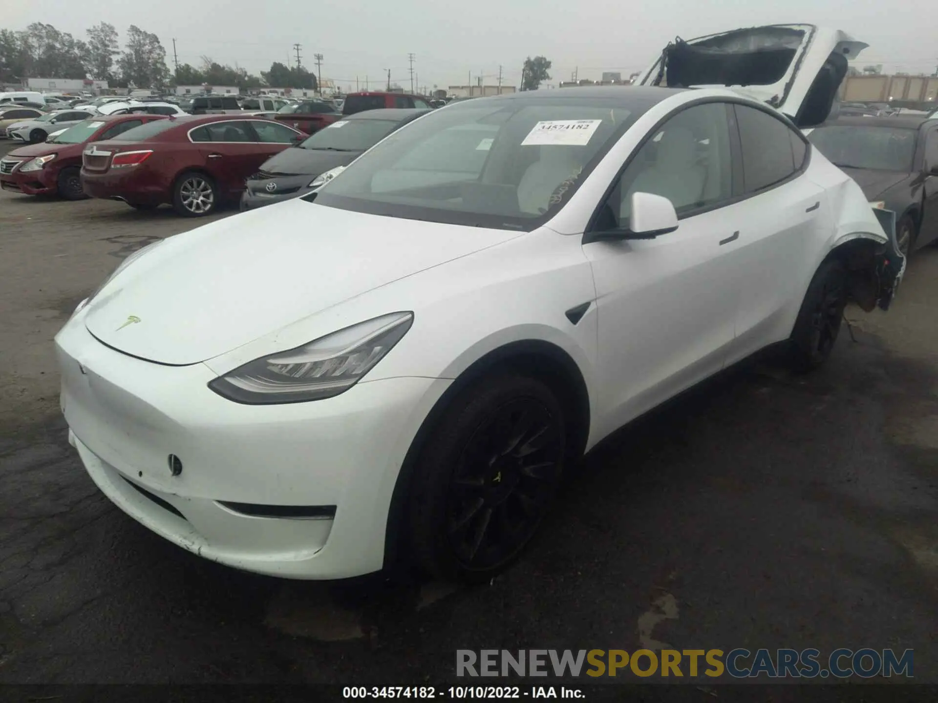 2 fotografías del automóvil dañado 5YJYGDEE1LF058683 TESLA MODEL Y 2020