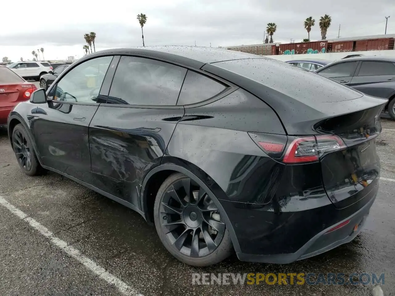 2 fotografías del automóvil dañado 5YJYGDEE2LF018466 TESLA MODEL Y 2020